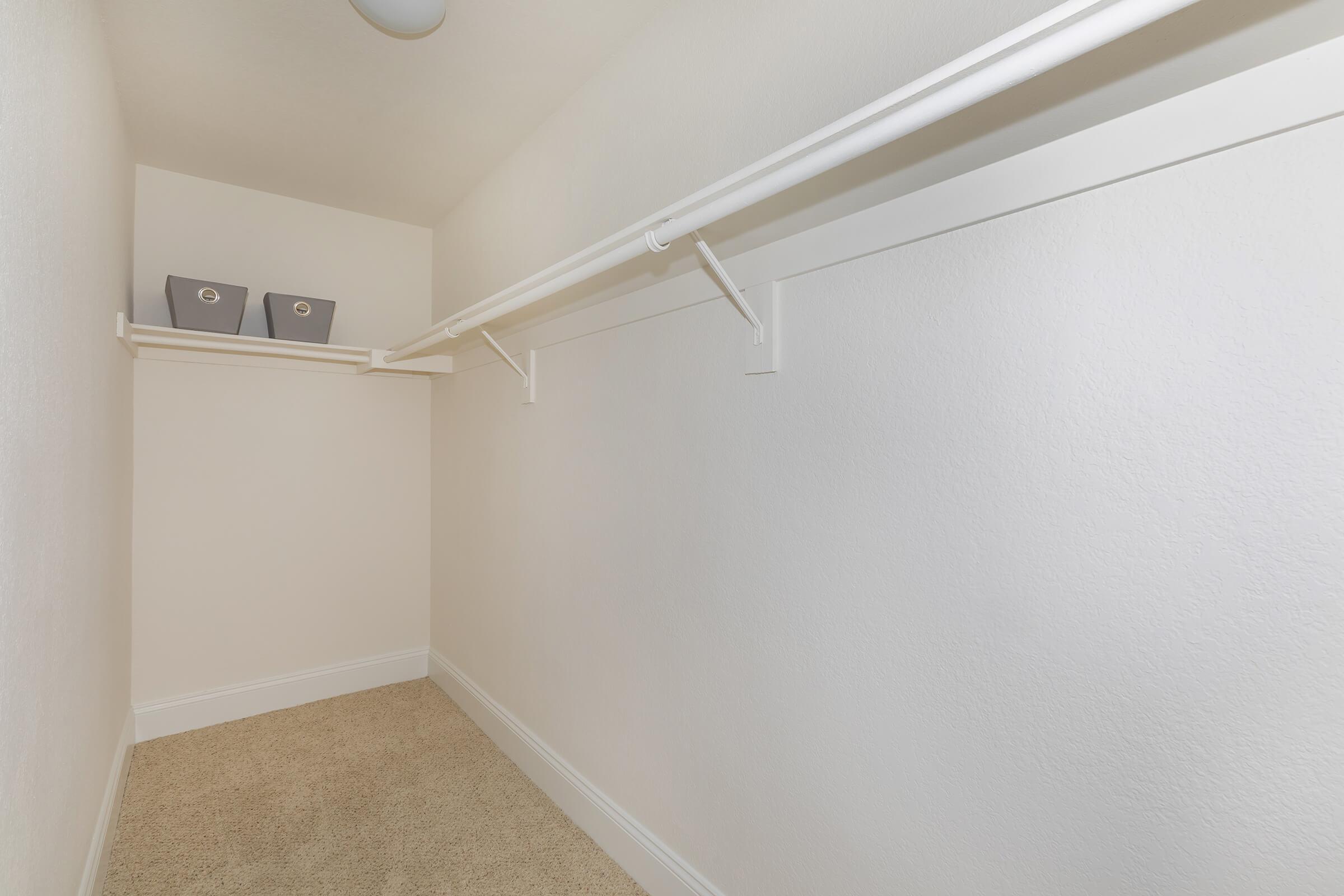 a large white tub next to a shower