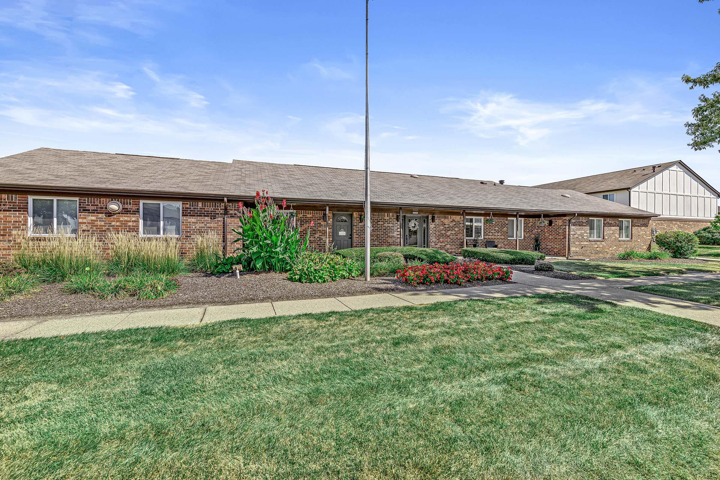 a house with a grass field