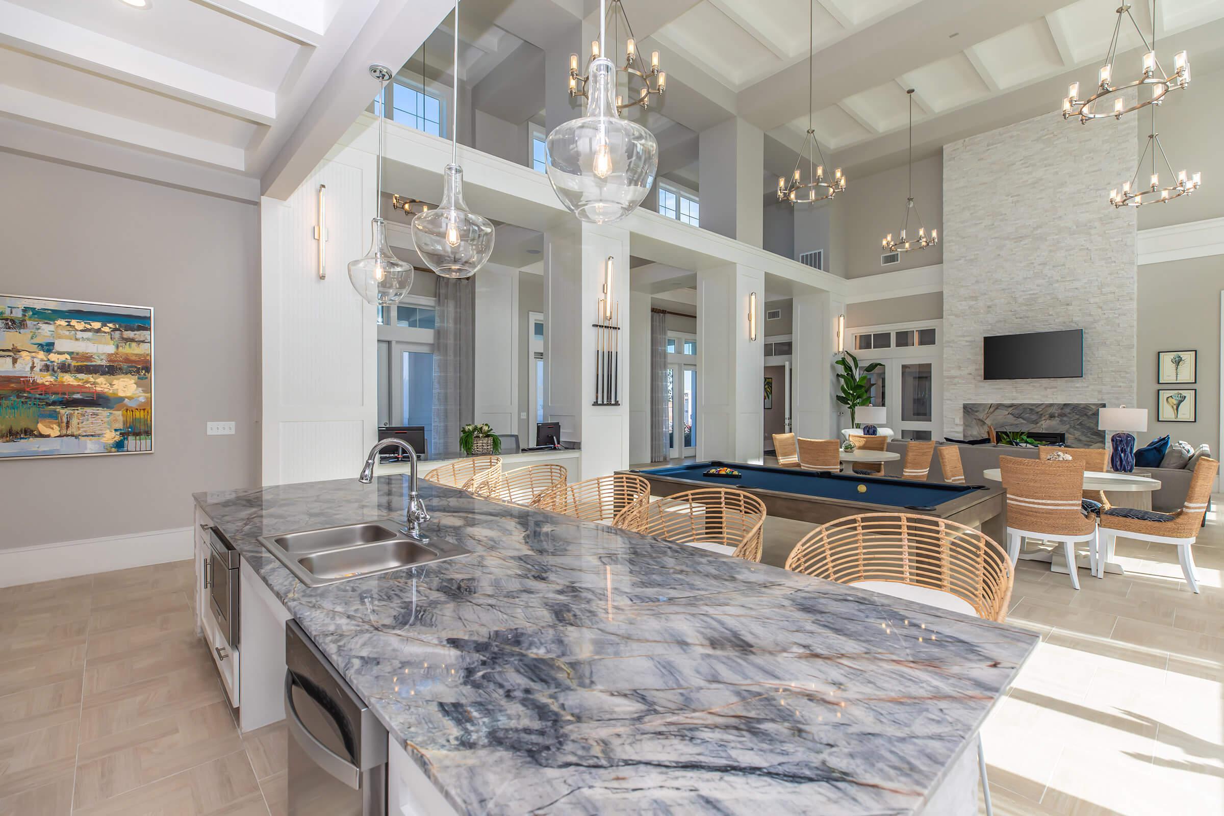 a kitchen with an island in the middle of a room