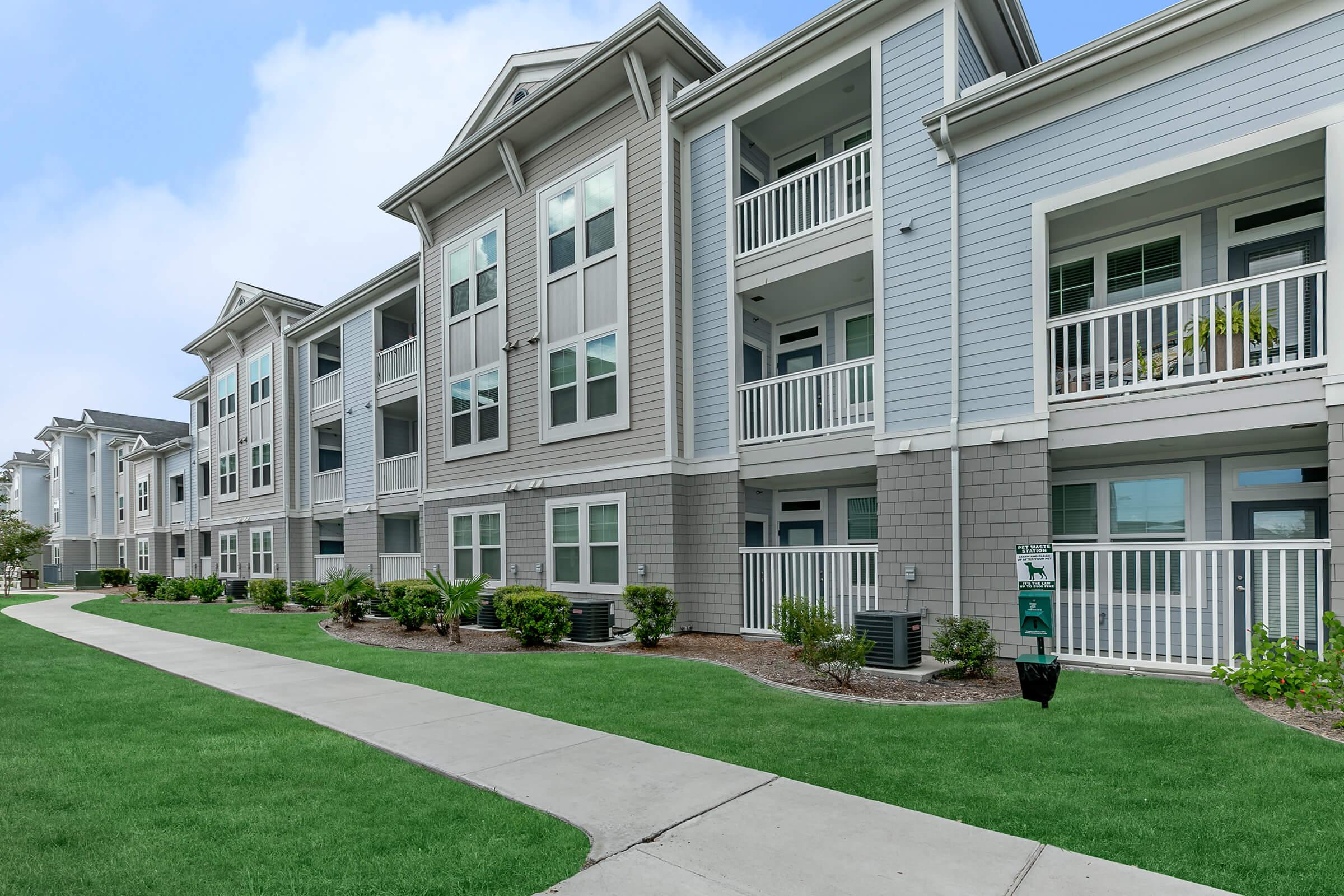 a large lawn in front of a building