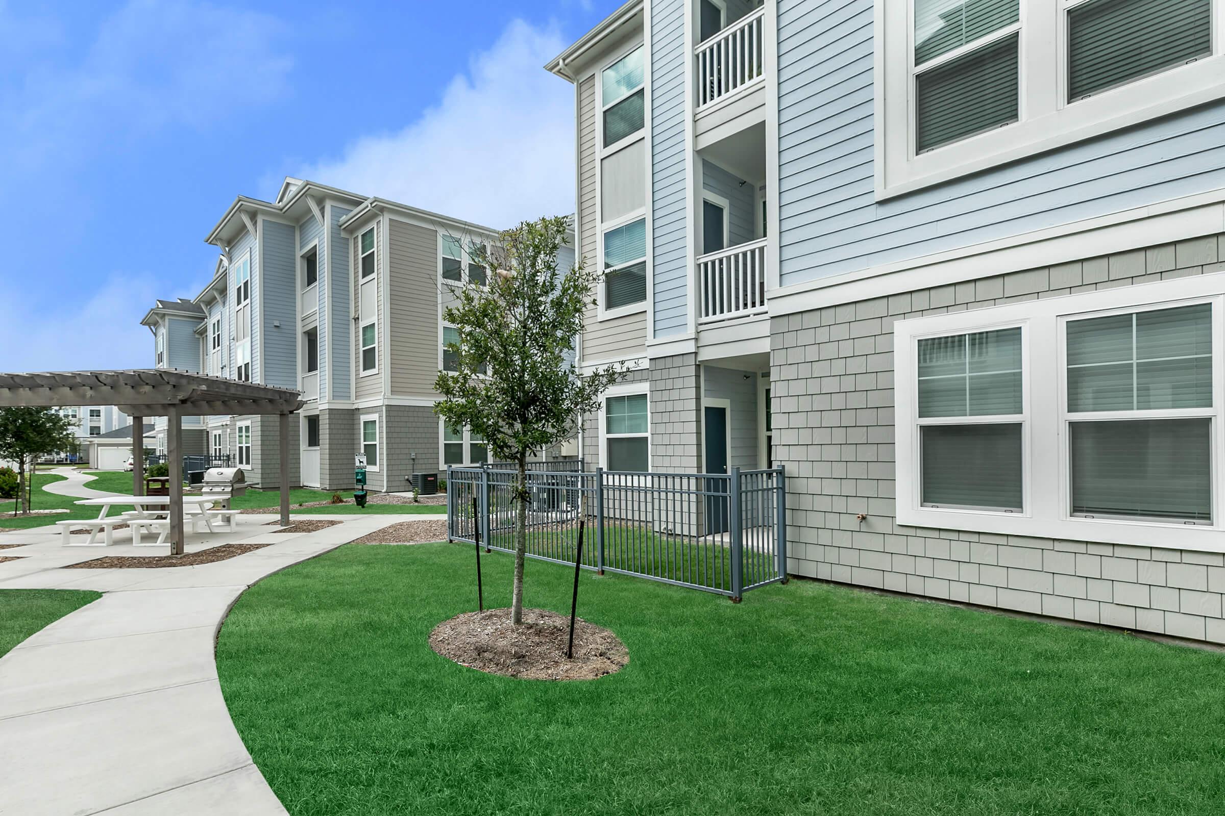 a large lawn in front of a building