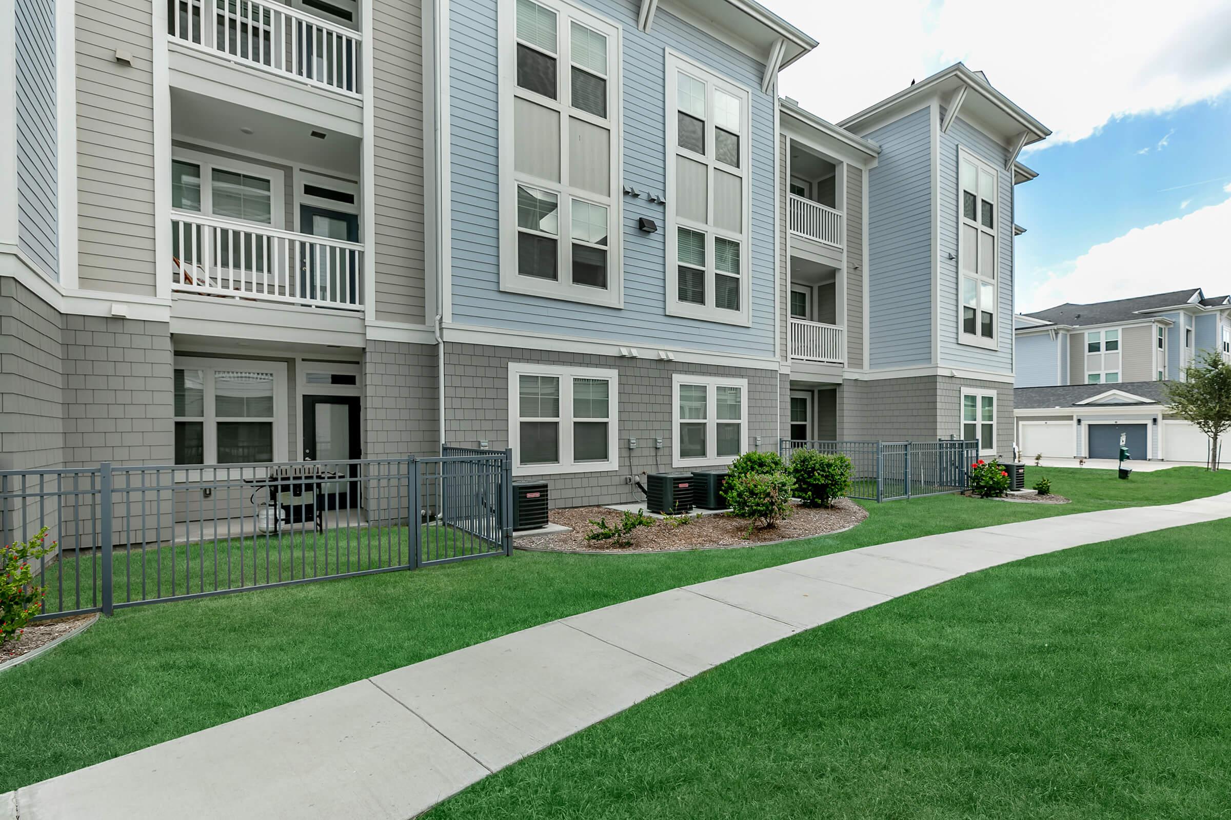 a large lawn in front of a building