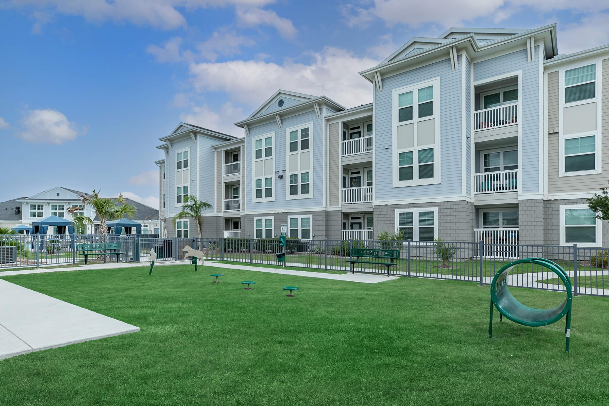 a large lawn in front of a building