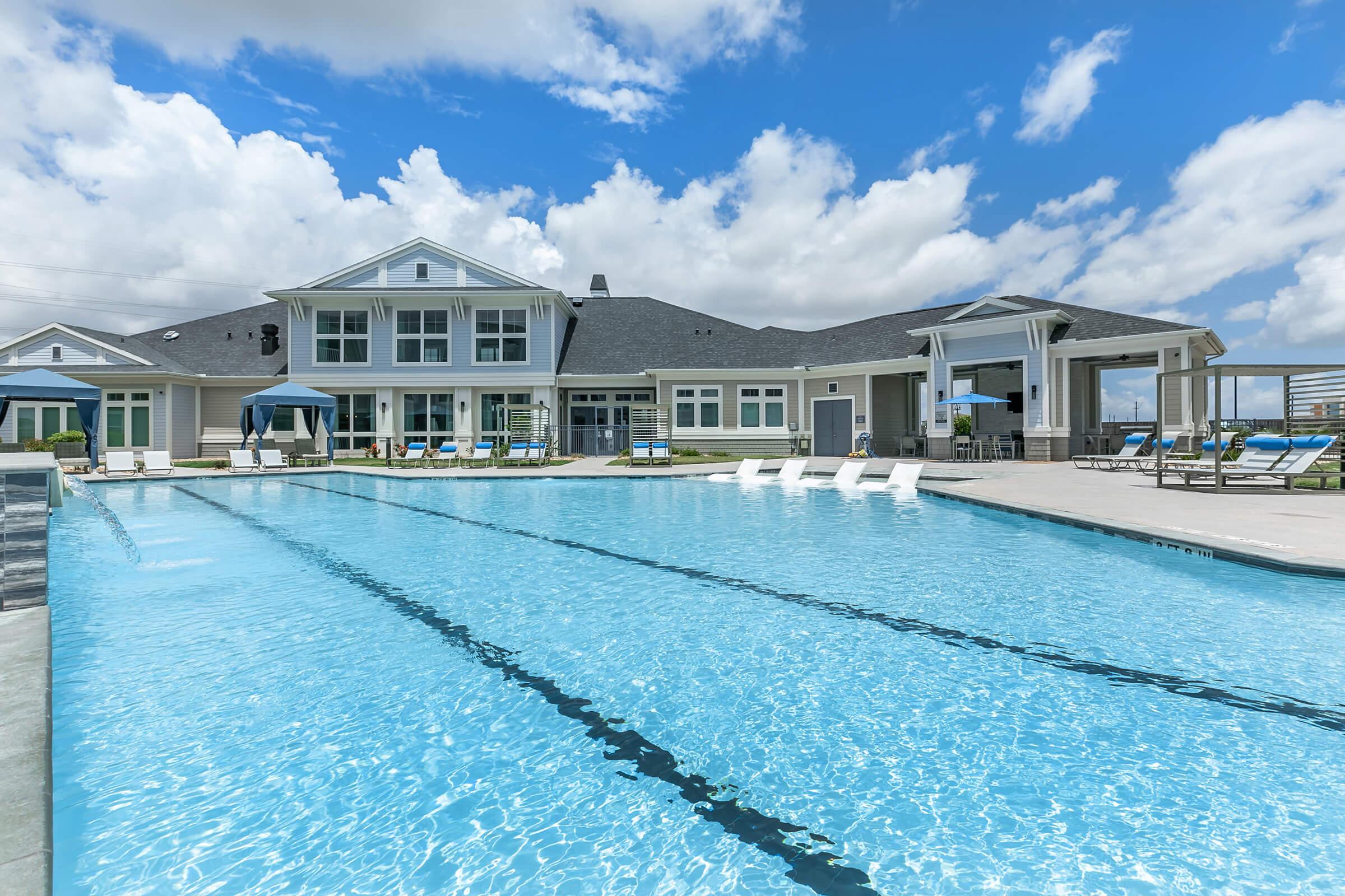 a pool next to a body of water