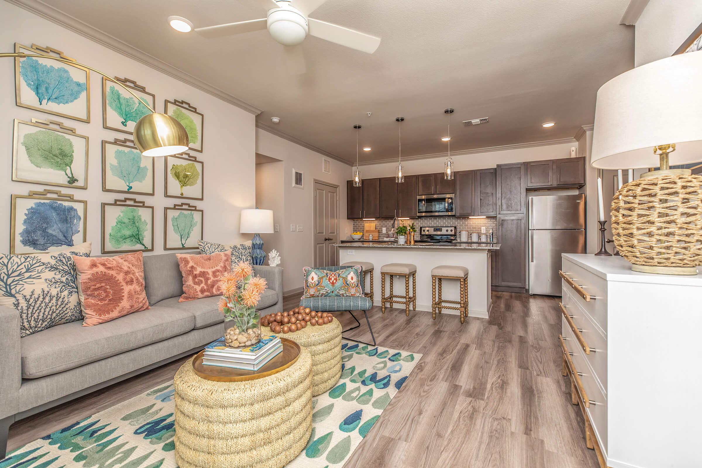 a living room filled with lots of furniture