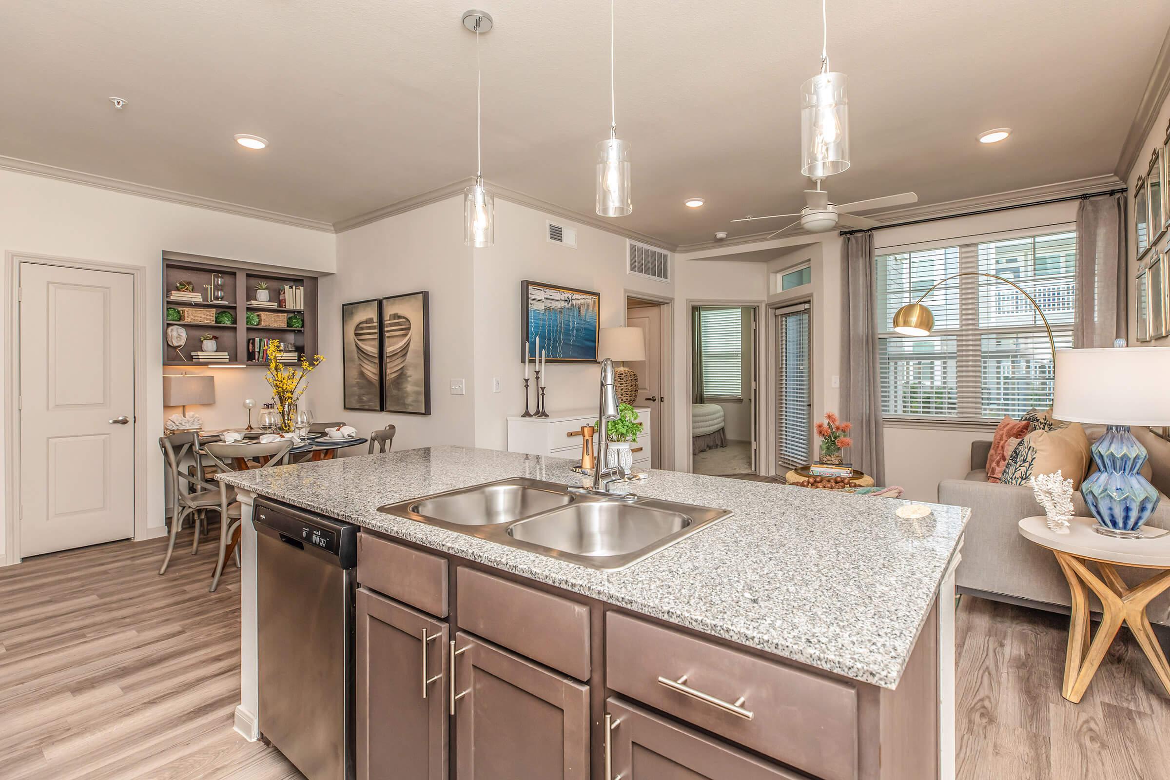 a kitchen with a sink and a window