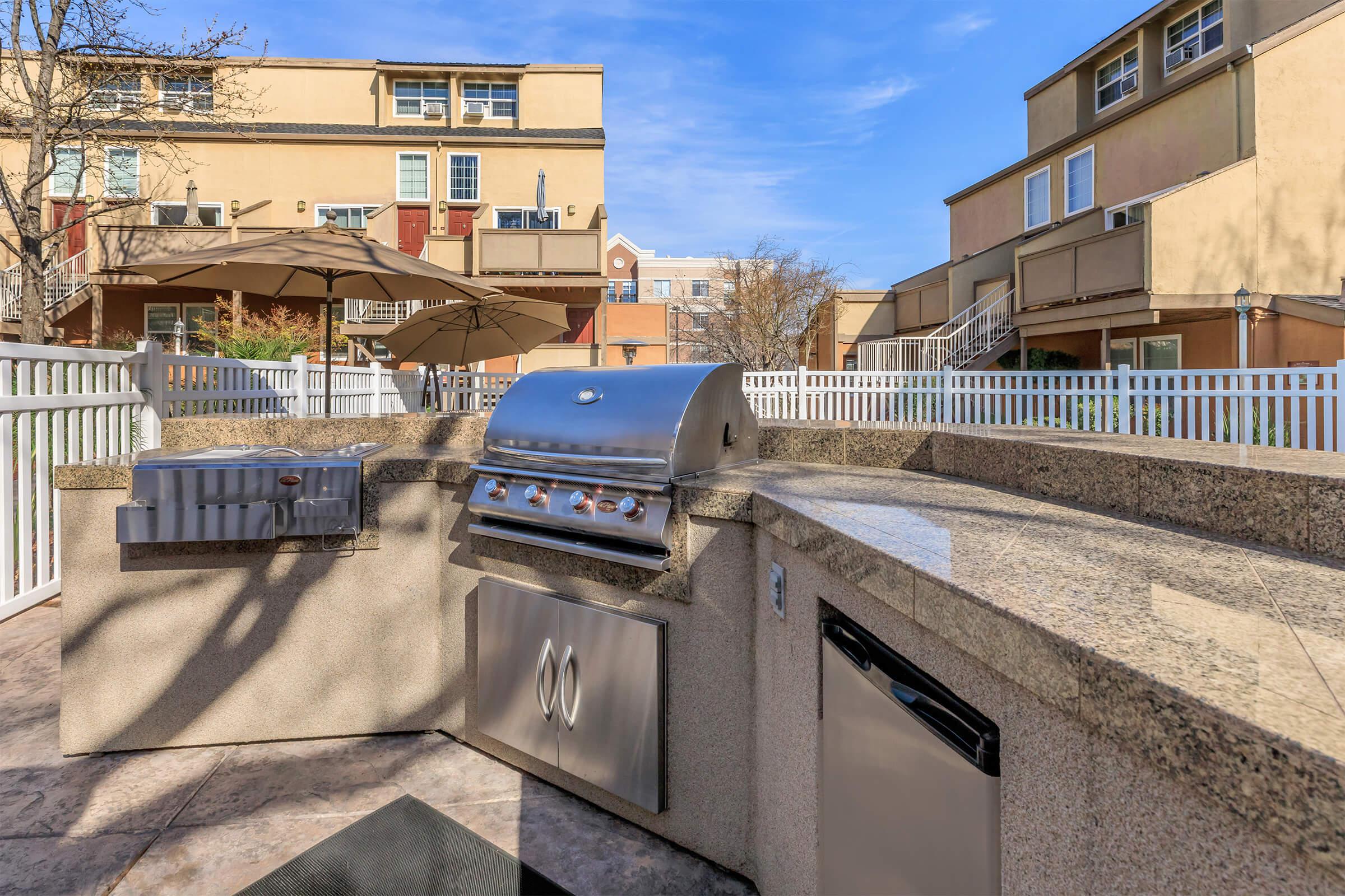 a train is parked on the side of a building