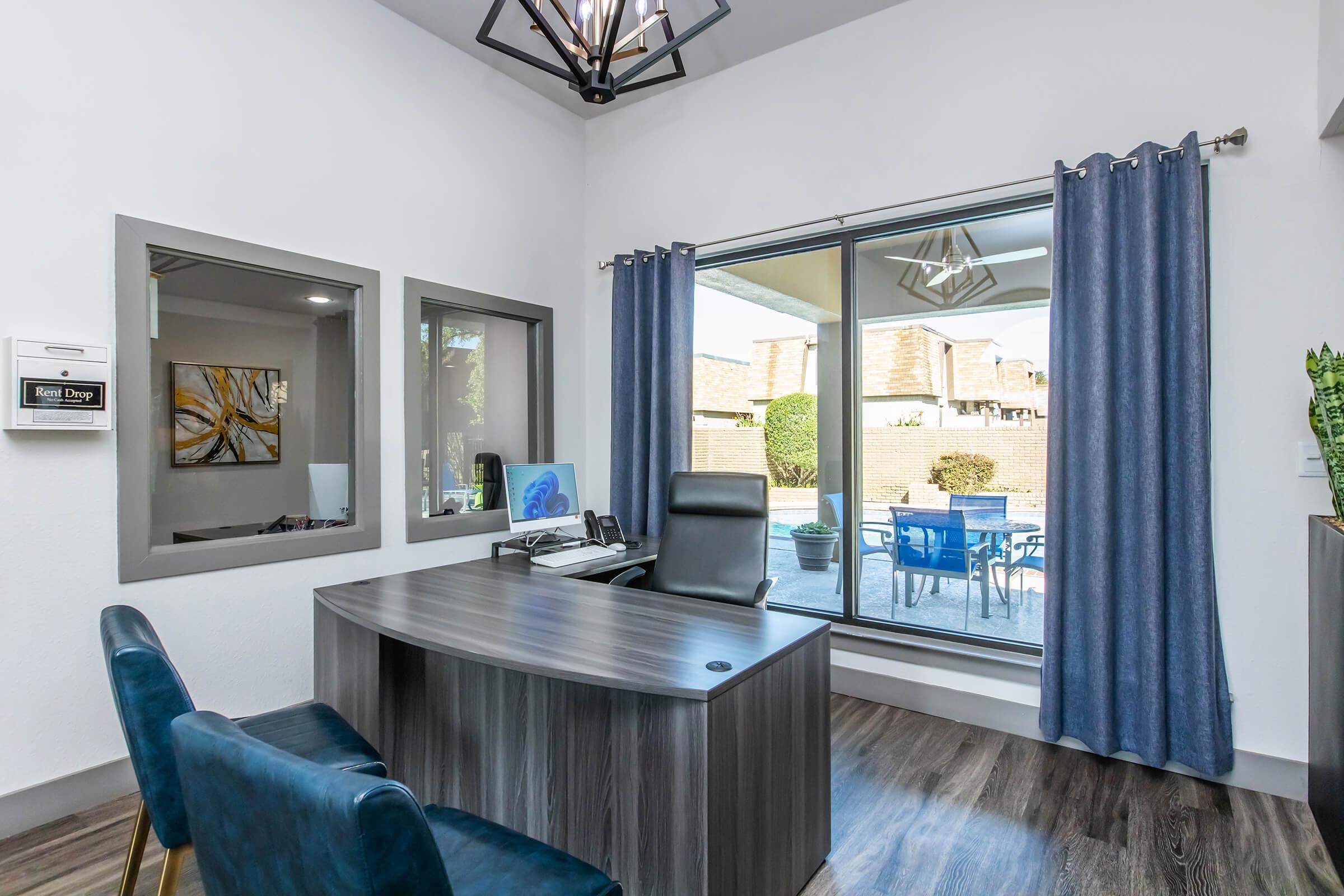 a kitchen with an island in the middle of a room