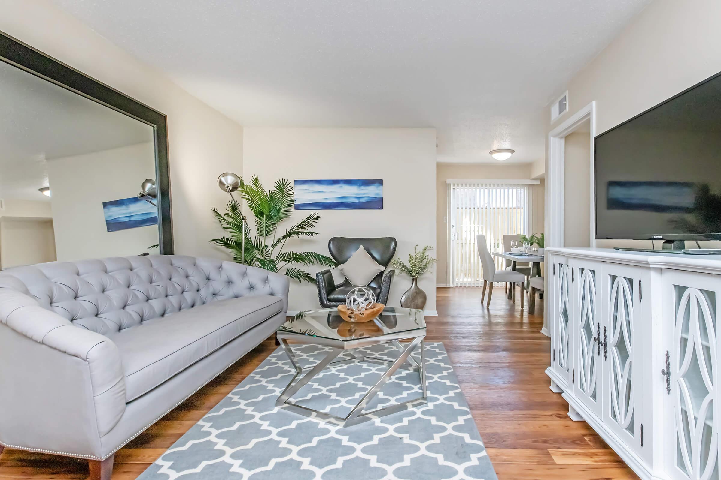 a living room with a wood floor