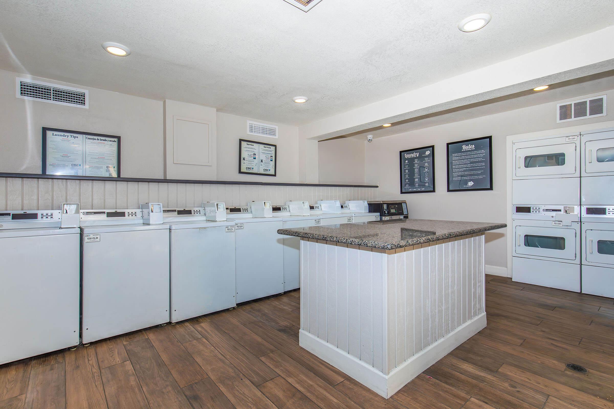 a kitchen with a wood floor