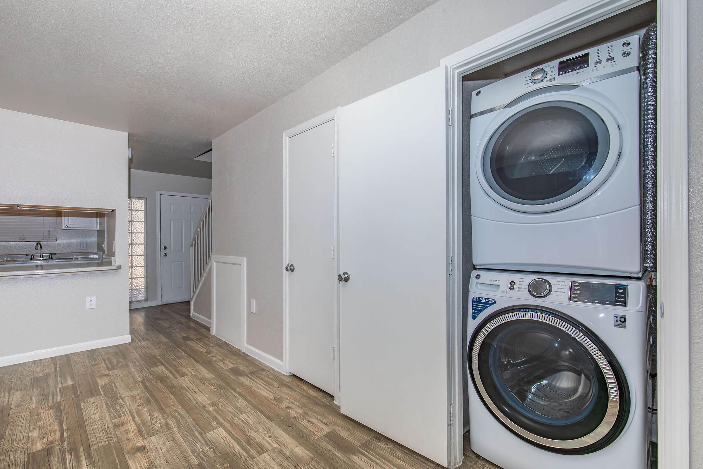 a kitchen with a sink and a microwave