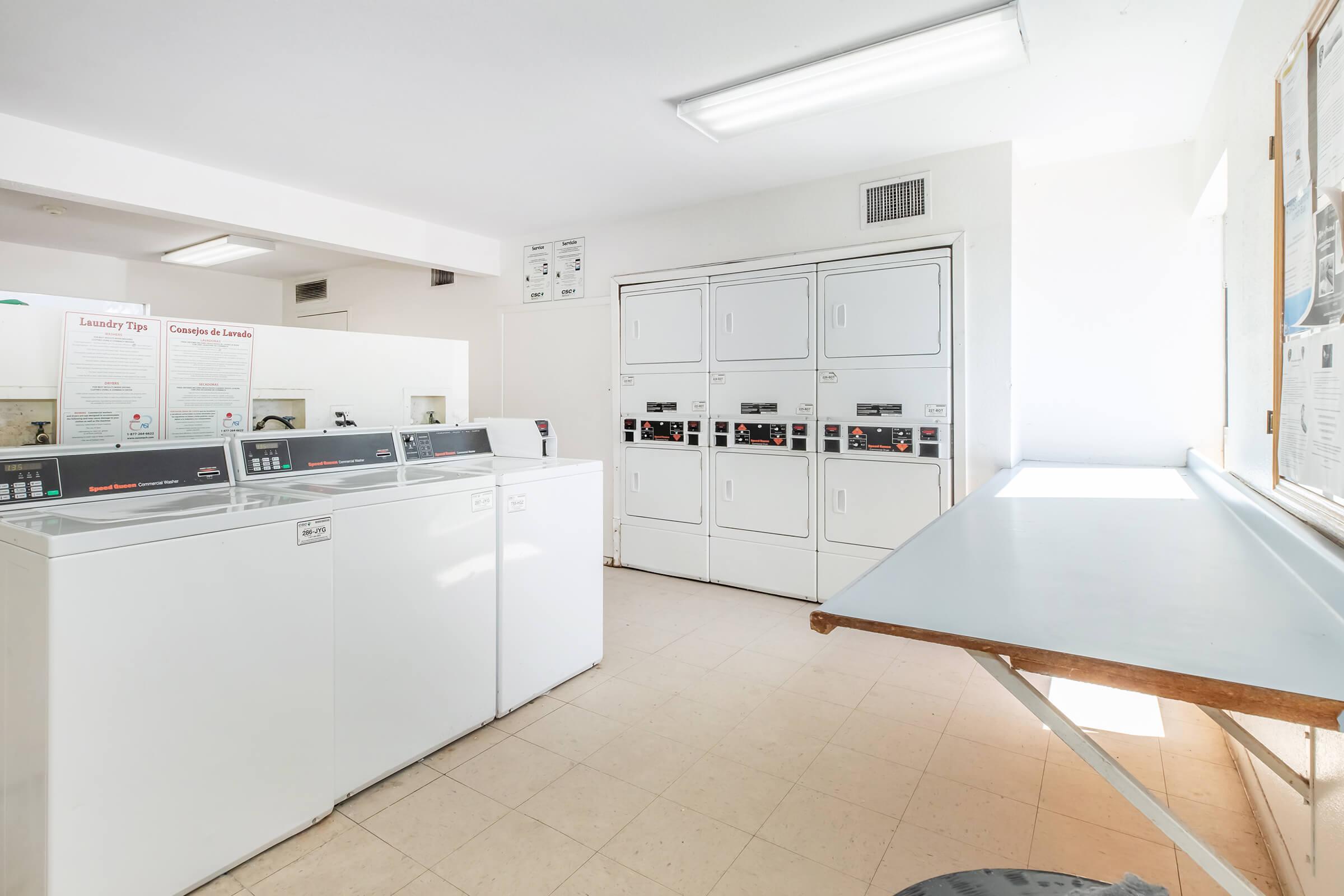 a kitchen with a stove and a refrigerator