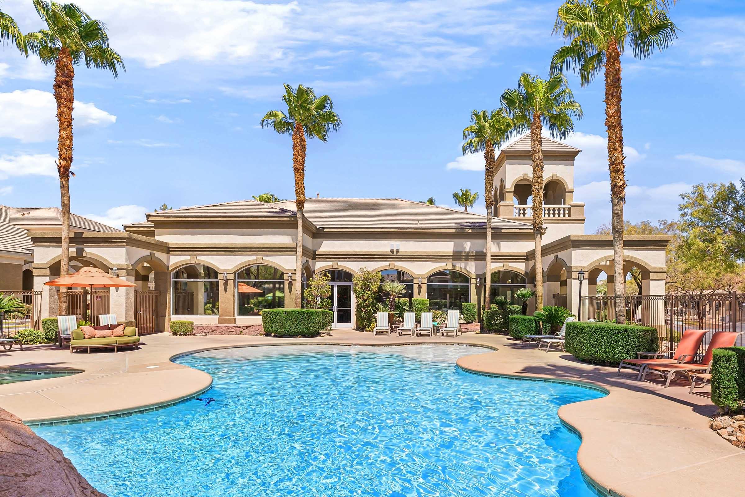 view of pool and clubhouse