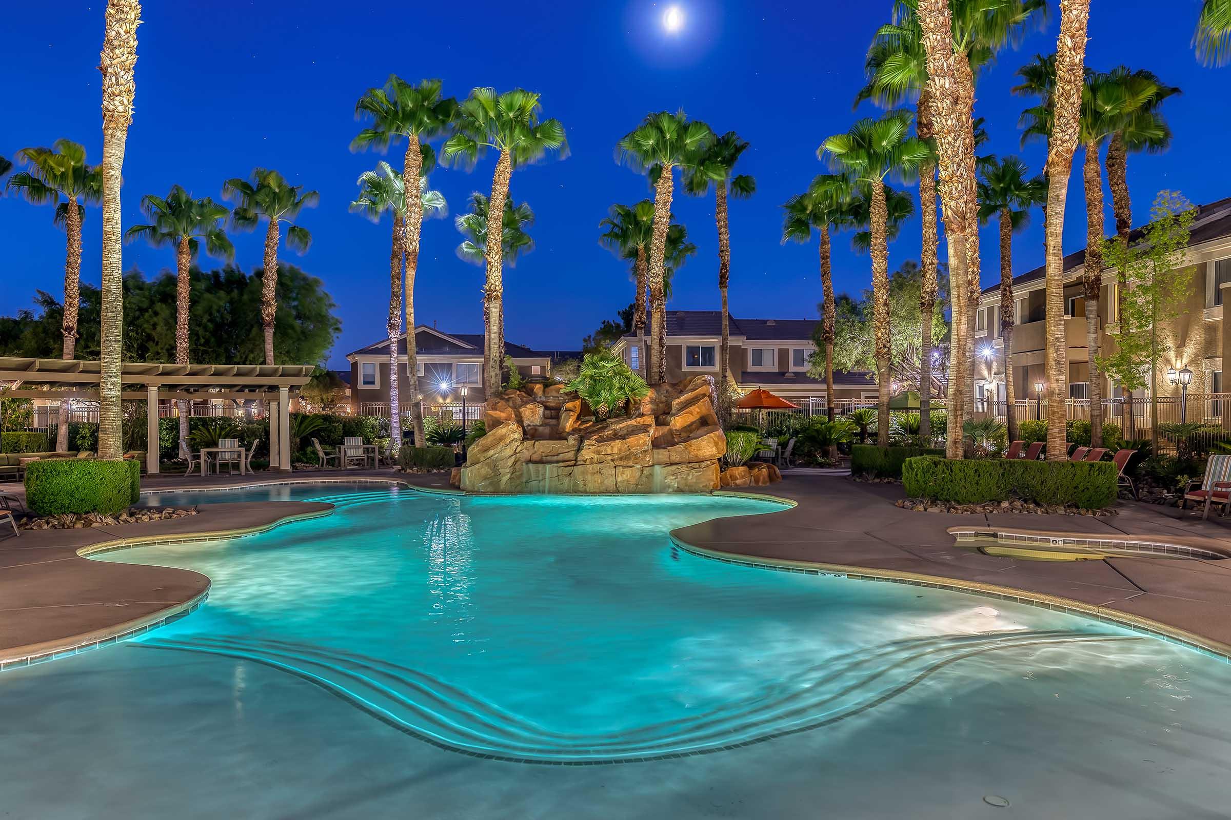 lighted swimming pool at night