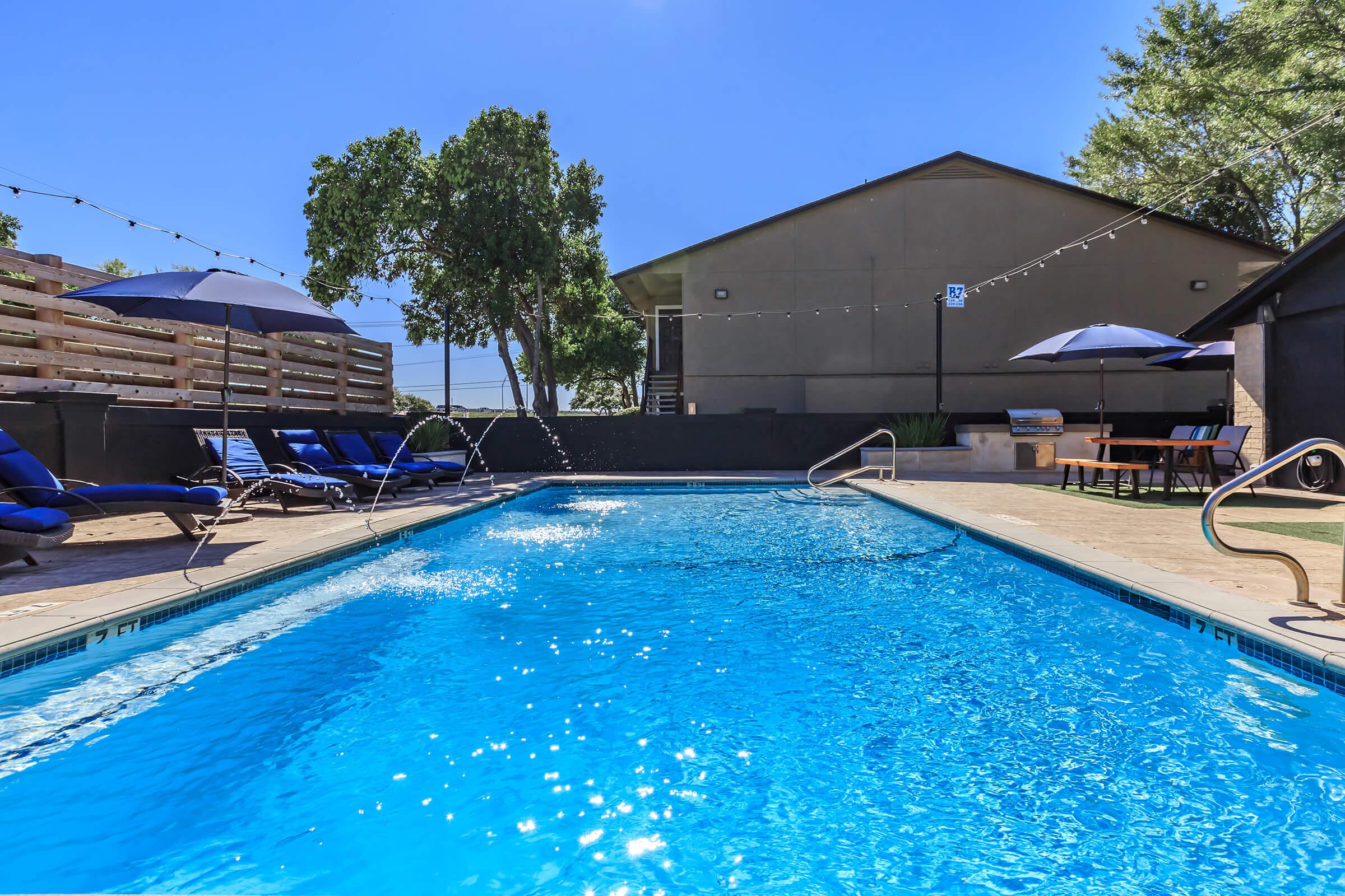 TAKE A DIP IN THE SPARKLING SWIMMING POOL