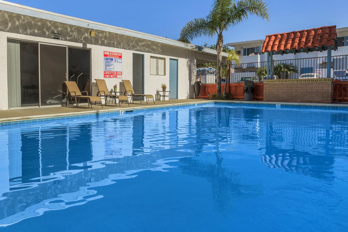 a large pool of water in front of a building