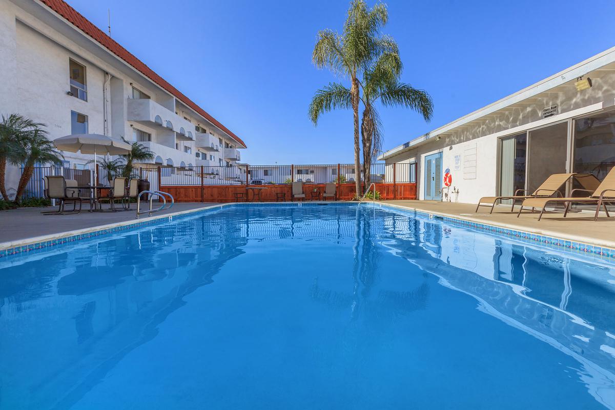 a house with a large pool of water