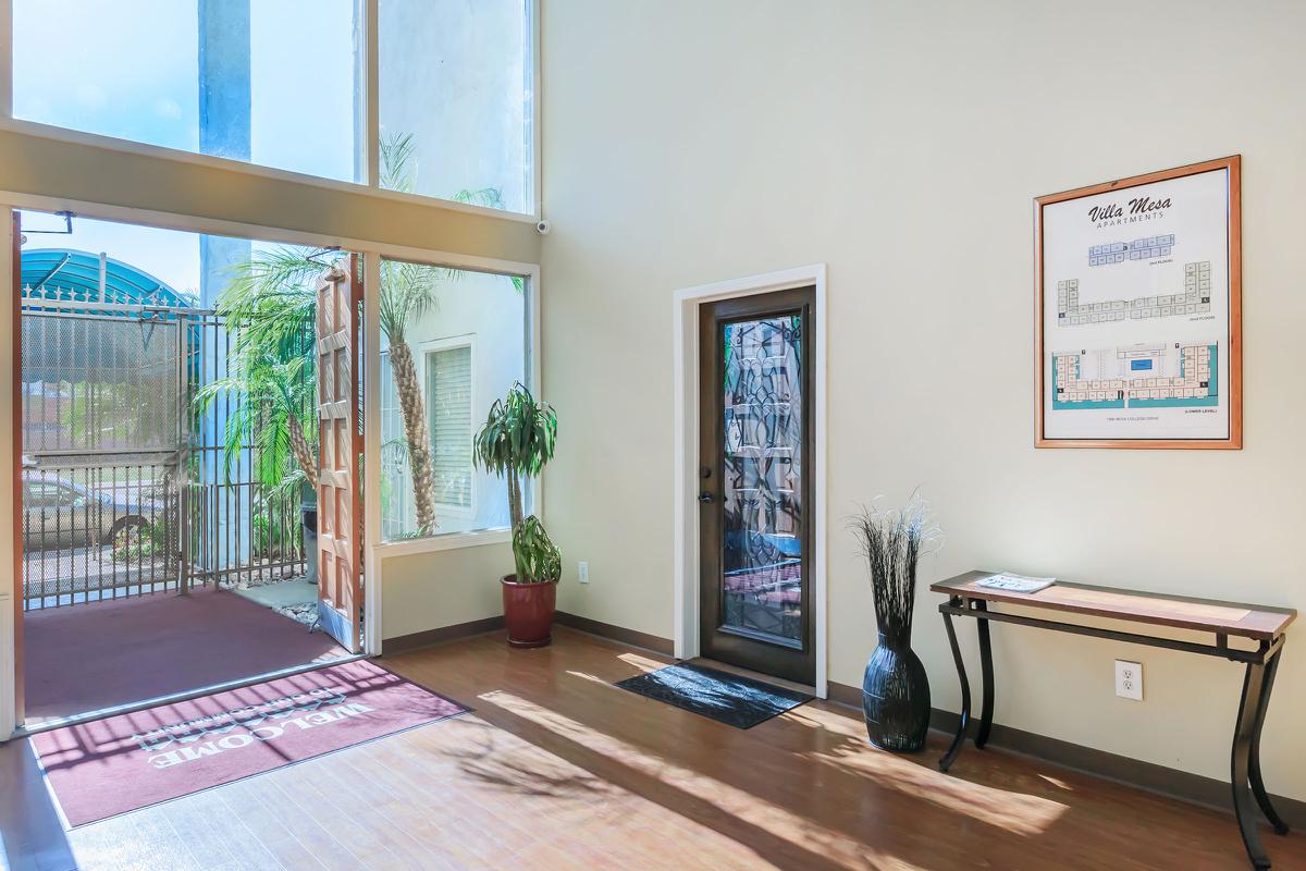 a living room next to a window