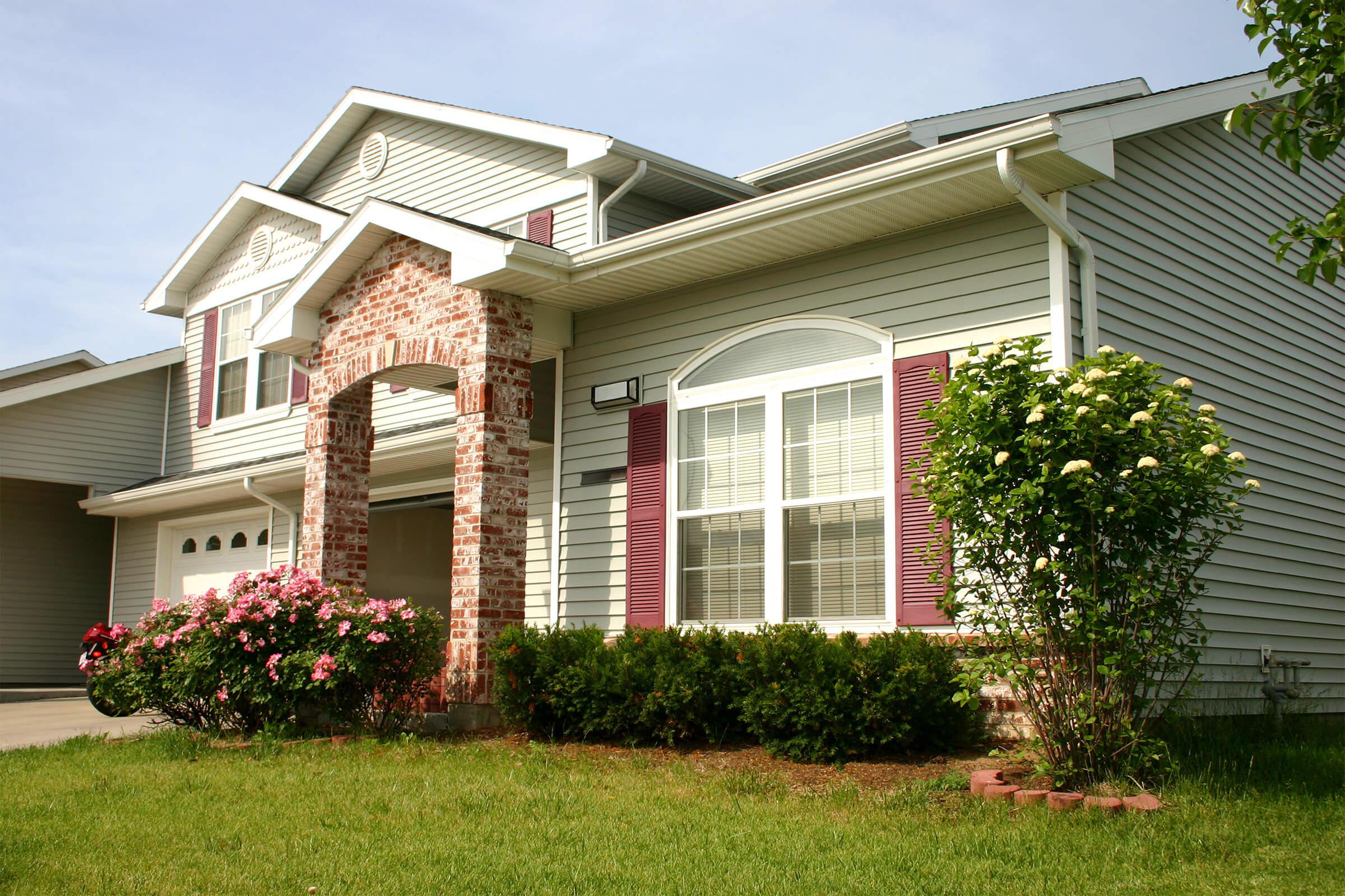 a large lawn in front of a house