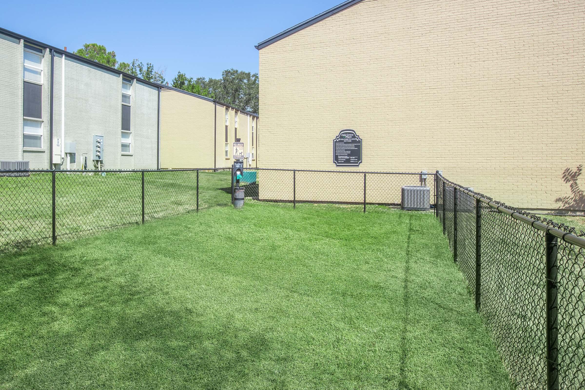 a building with green grass