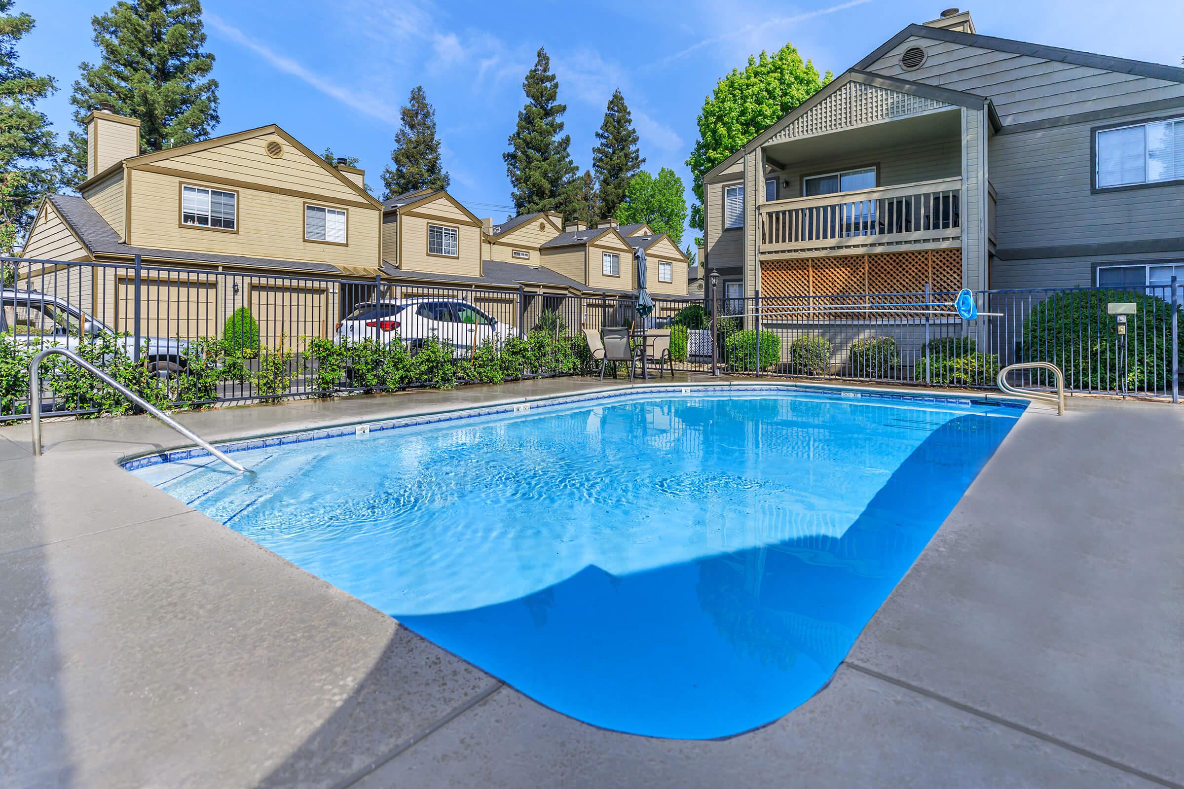 a pool next to a building