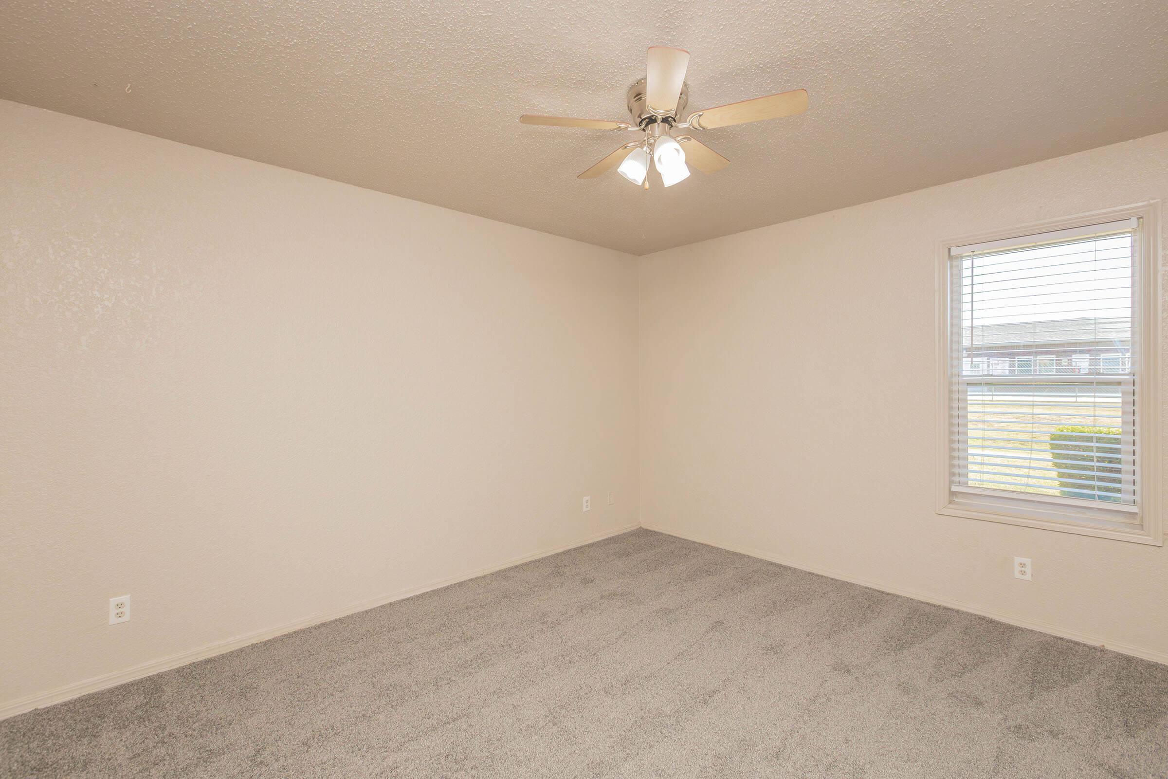 a room with a sink and a window