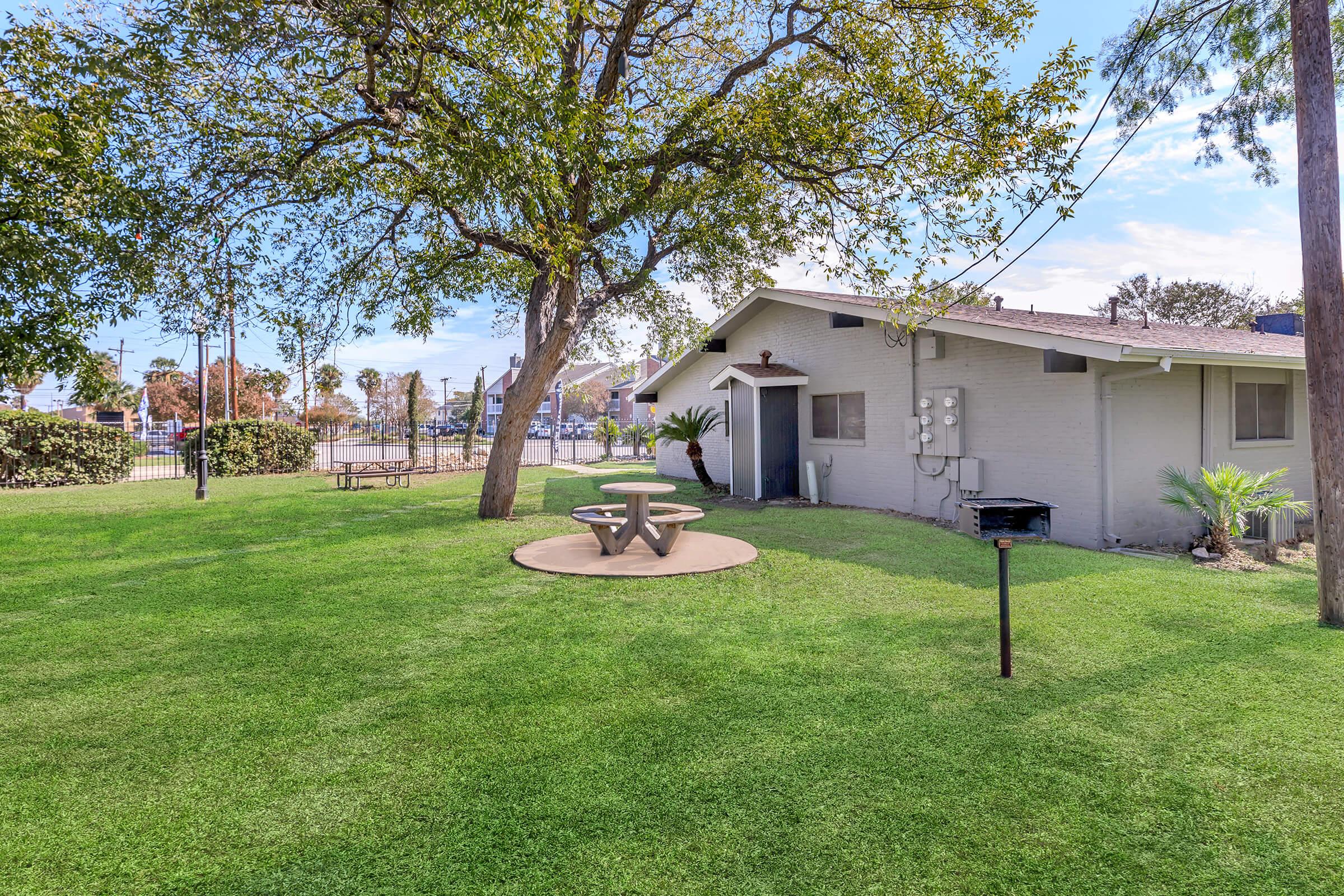 a large lawn in front of a house