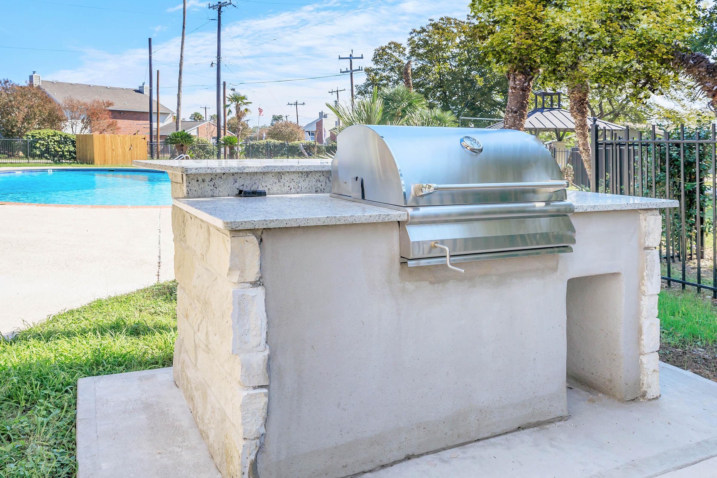 a statue of a cement bench