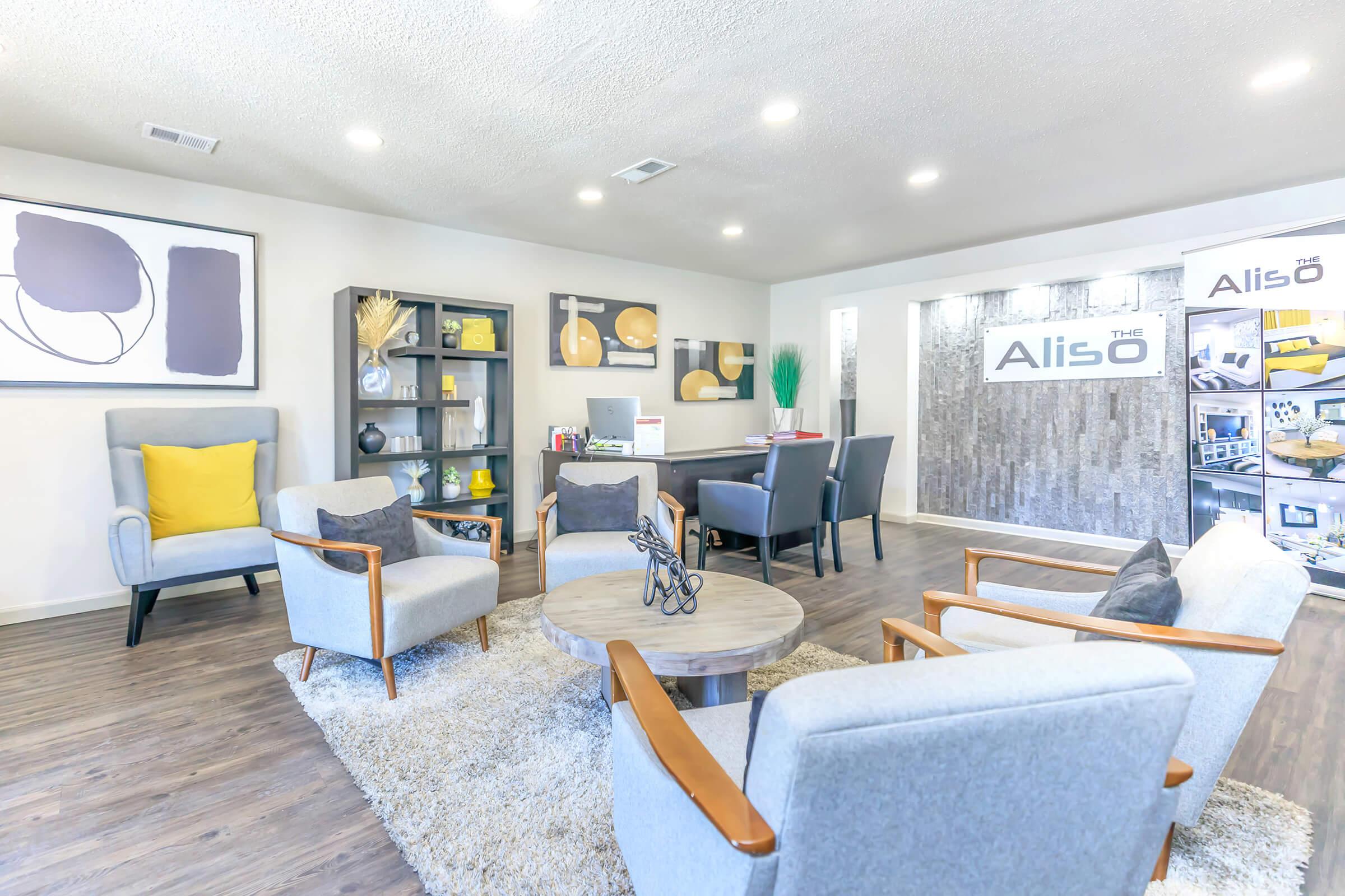 a living room filled with lots of furniture