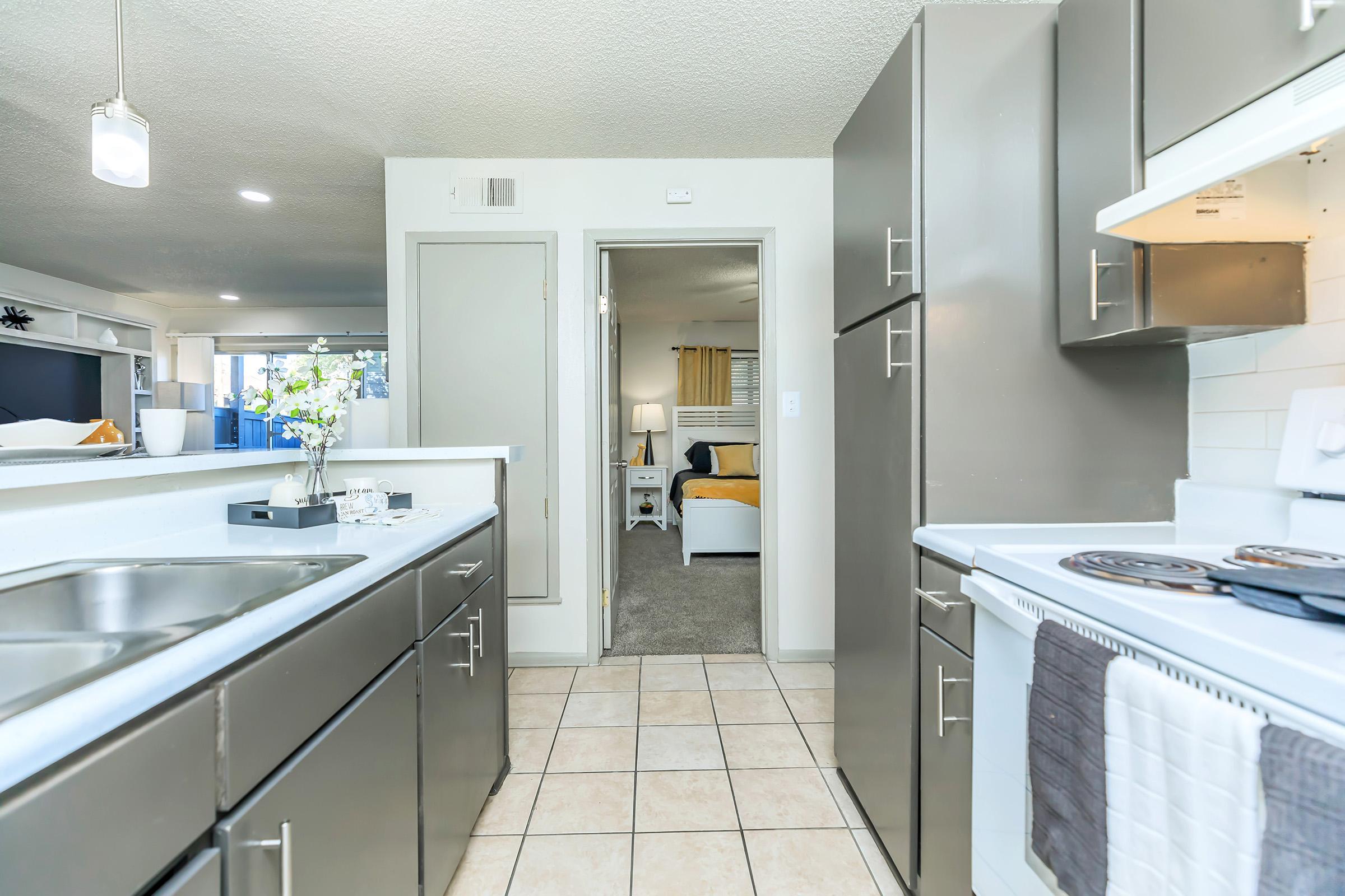 a kitchen with a sink and a window