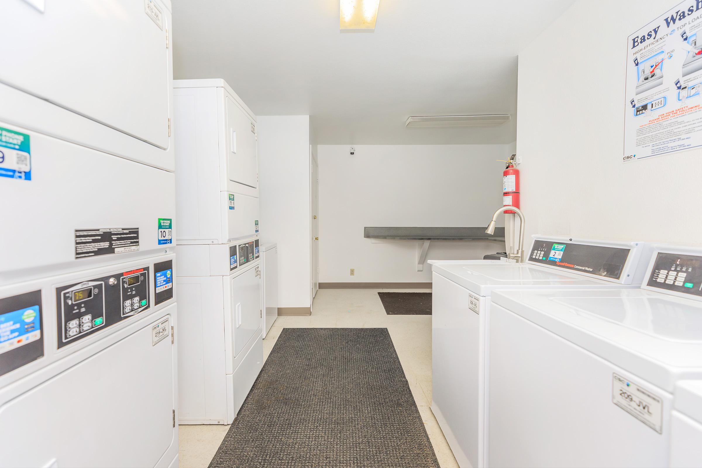 a kitchen with a stove and a refrigerator