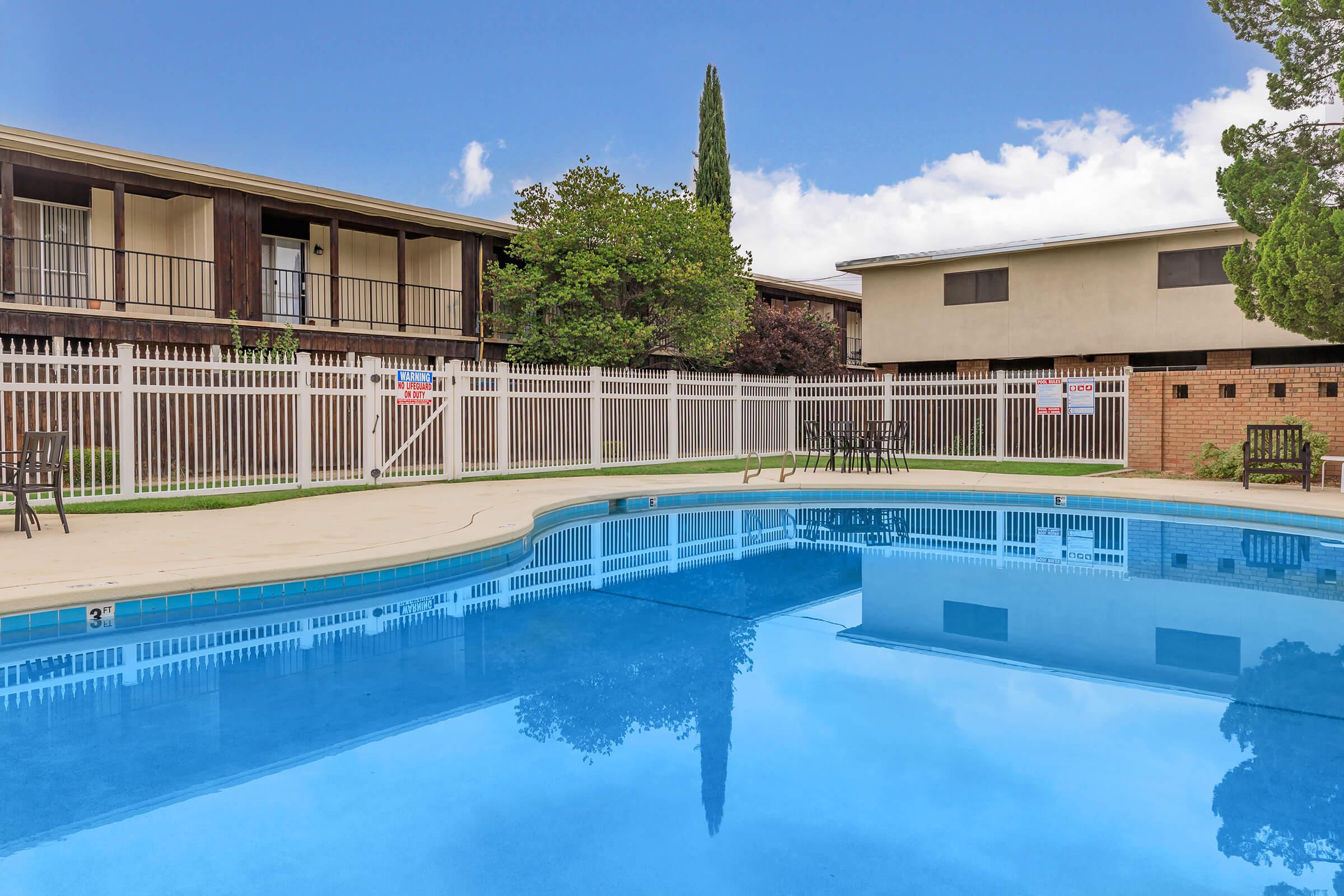 a large pool of water in front of a building