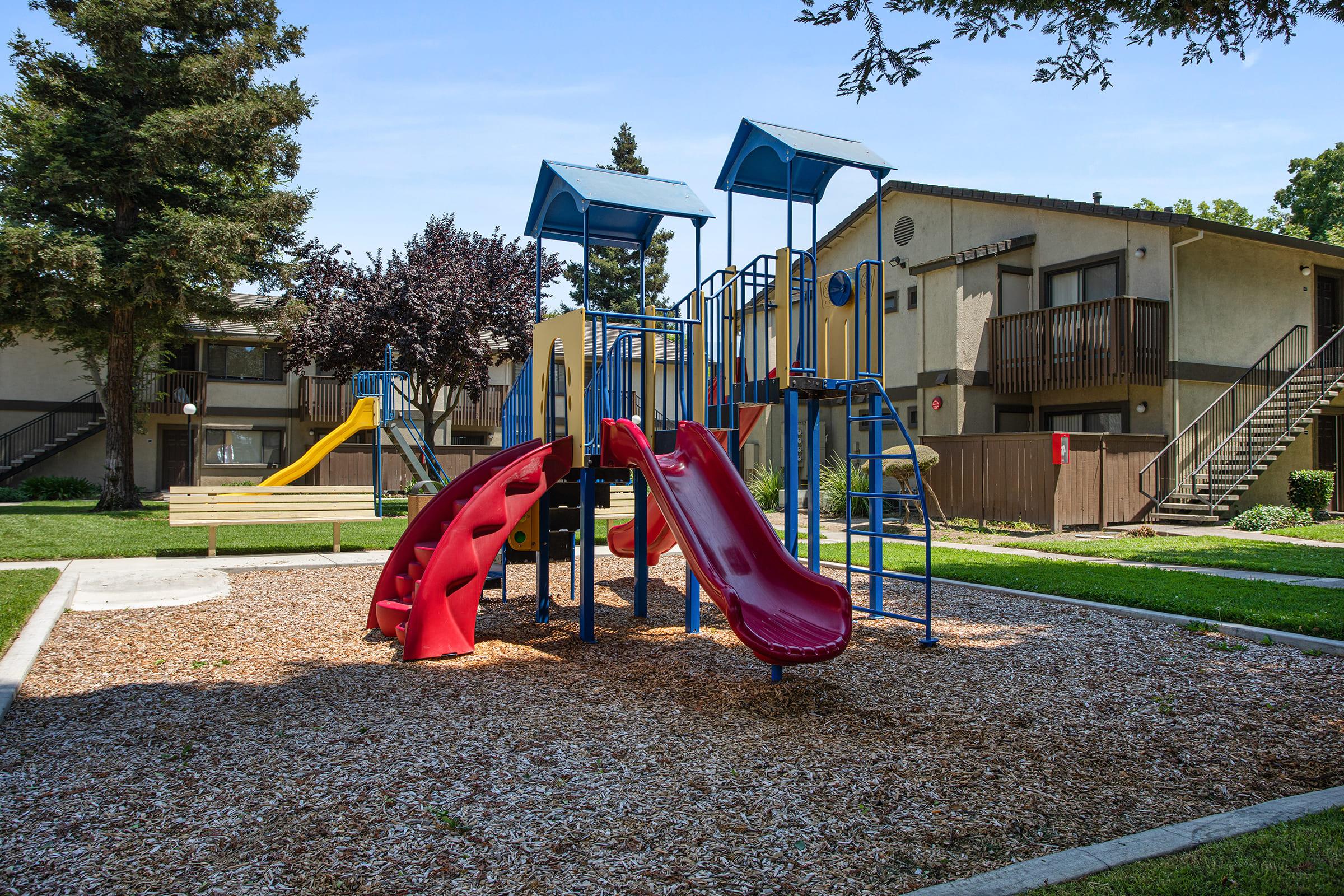 a playground in front of a building