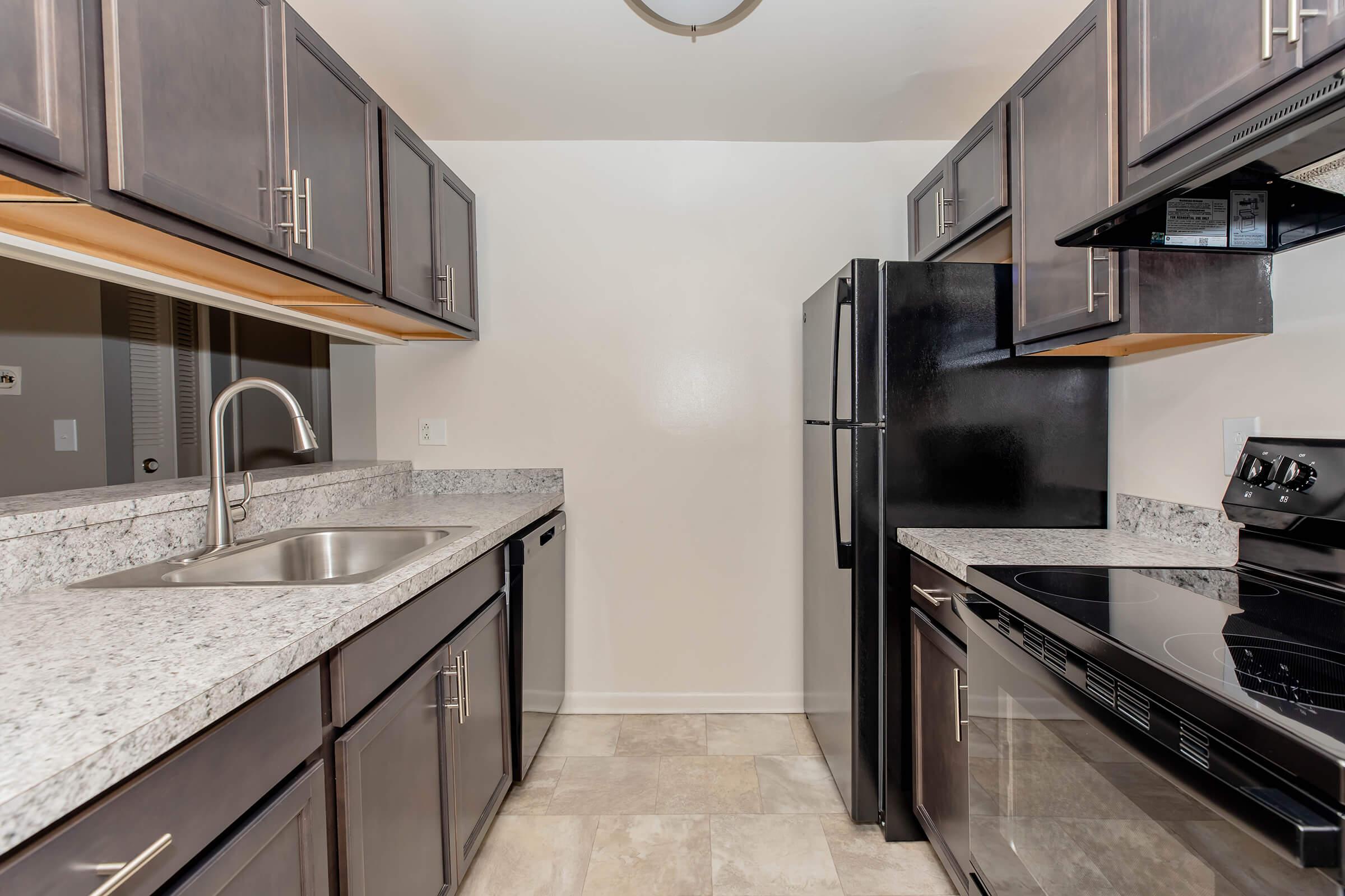 a modern kitchen with stainless steel appliances