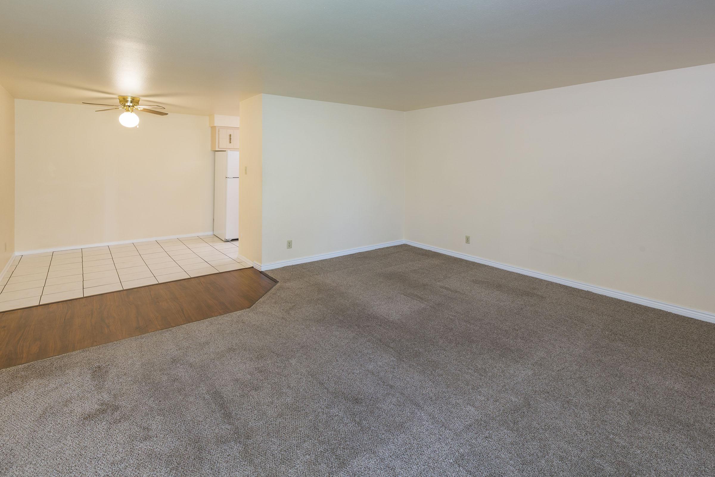 a bedroom with a bed in a room