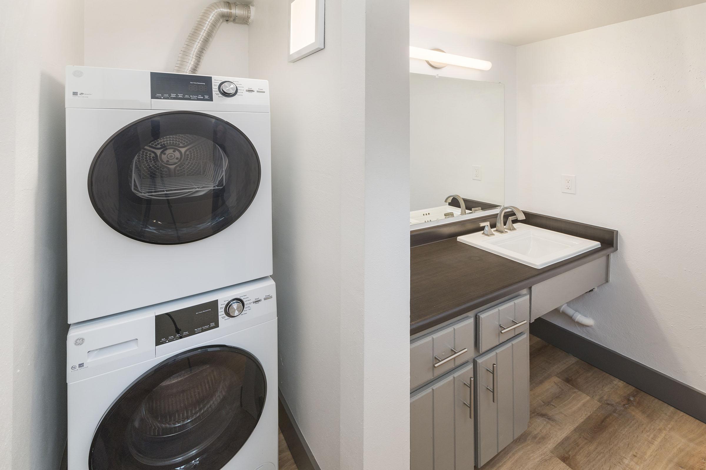 a white microwave oven sitting on top of a stove