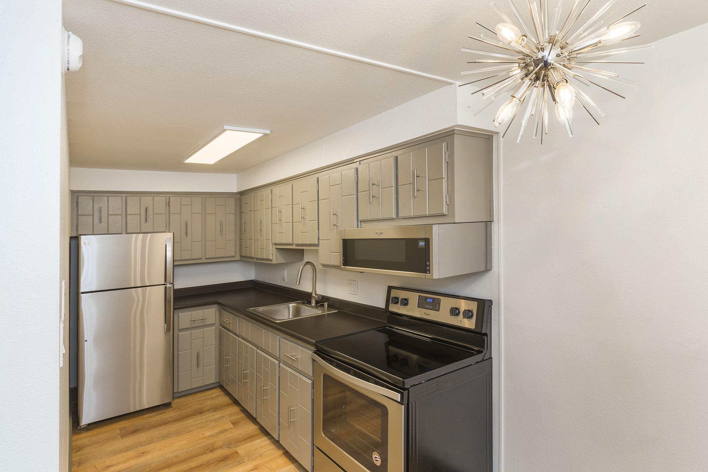 a stainless steel refrigerator in a kitchen