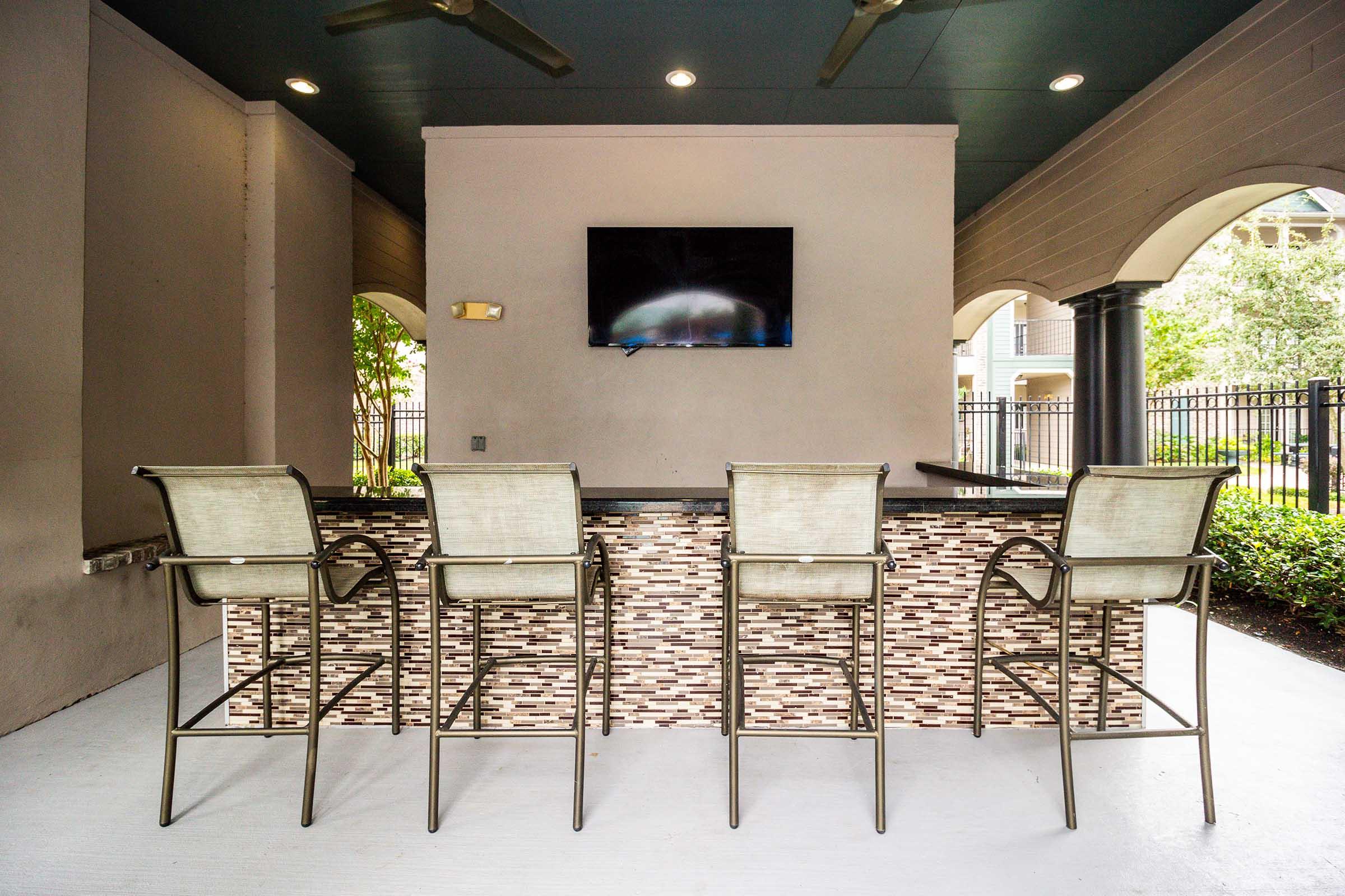 a living room filled with furniture and a fireplace