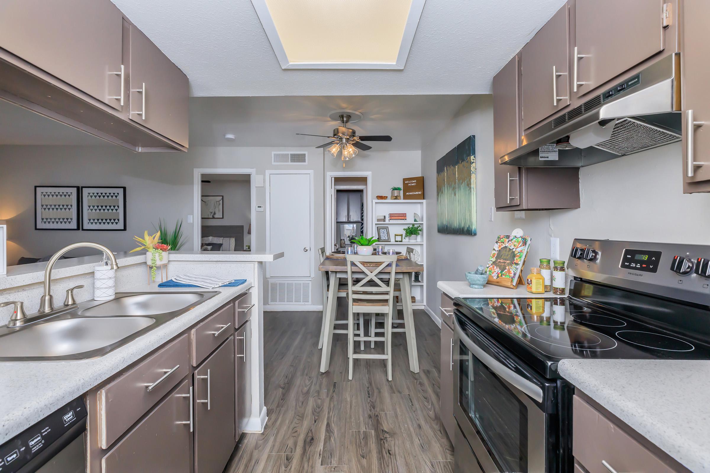 a modern kitchen with stainless steel appliances