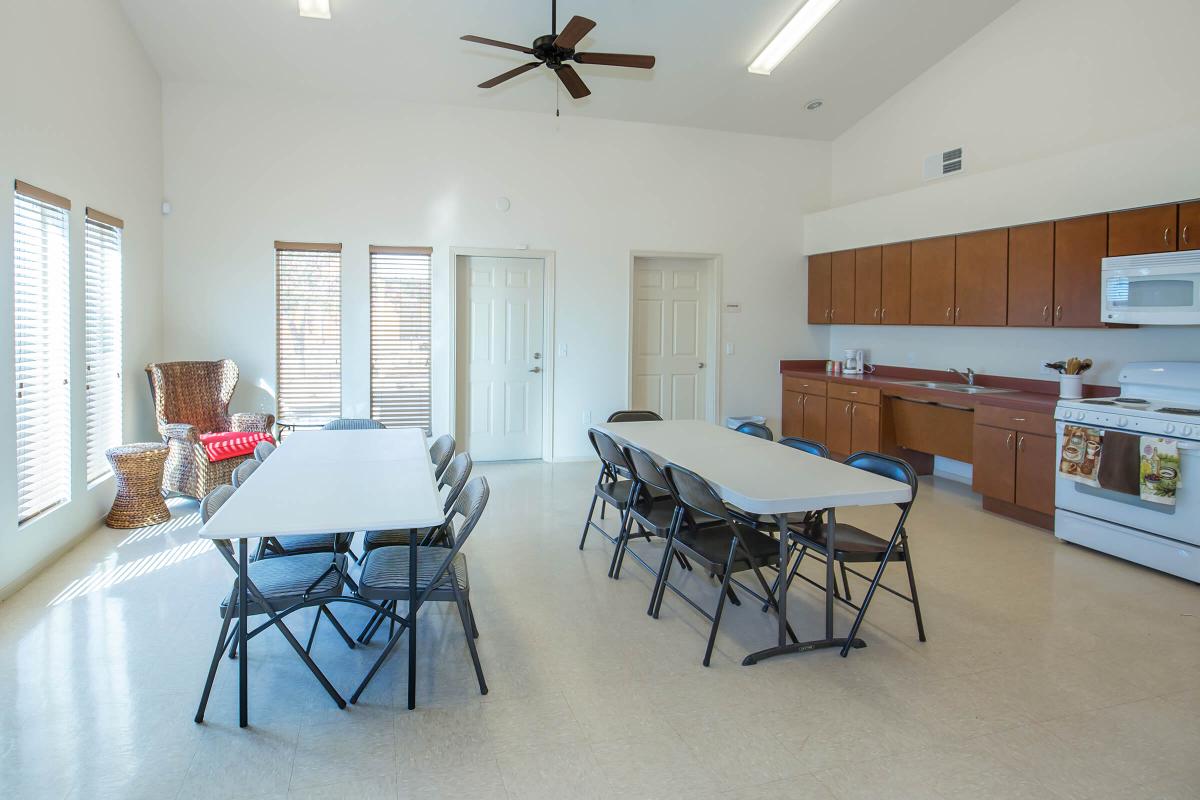 a room filled with furniture and a table