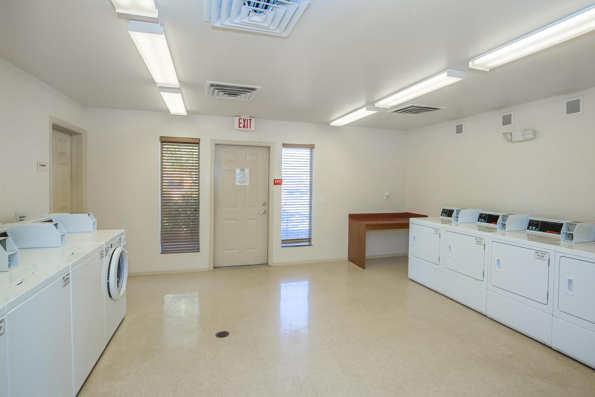 a large white refrigerator in a kitchen