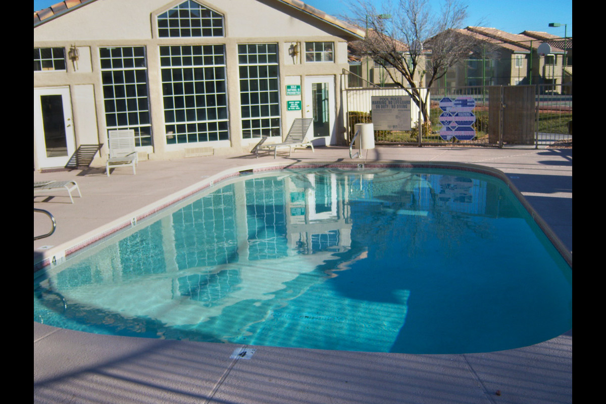 a pool next to a building