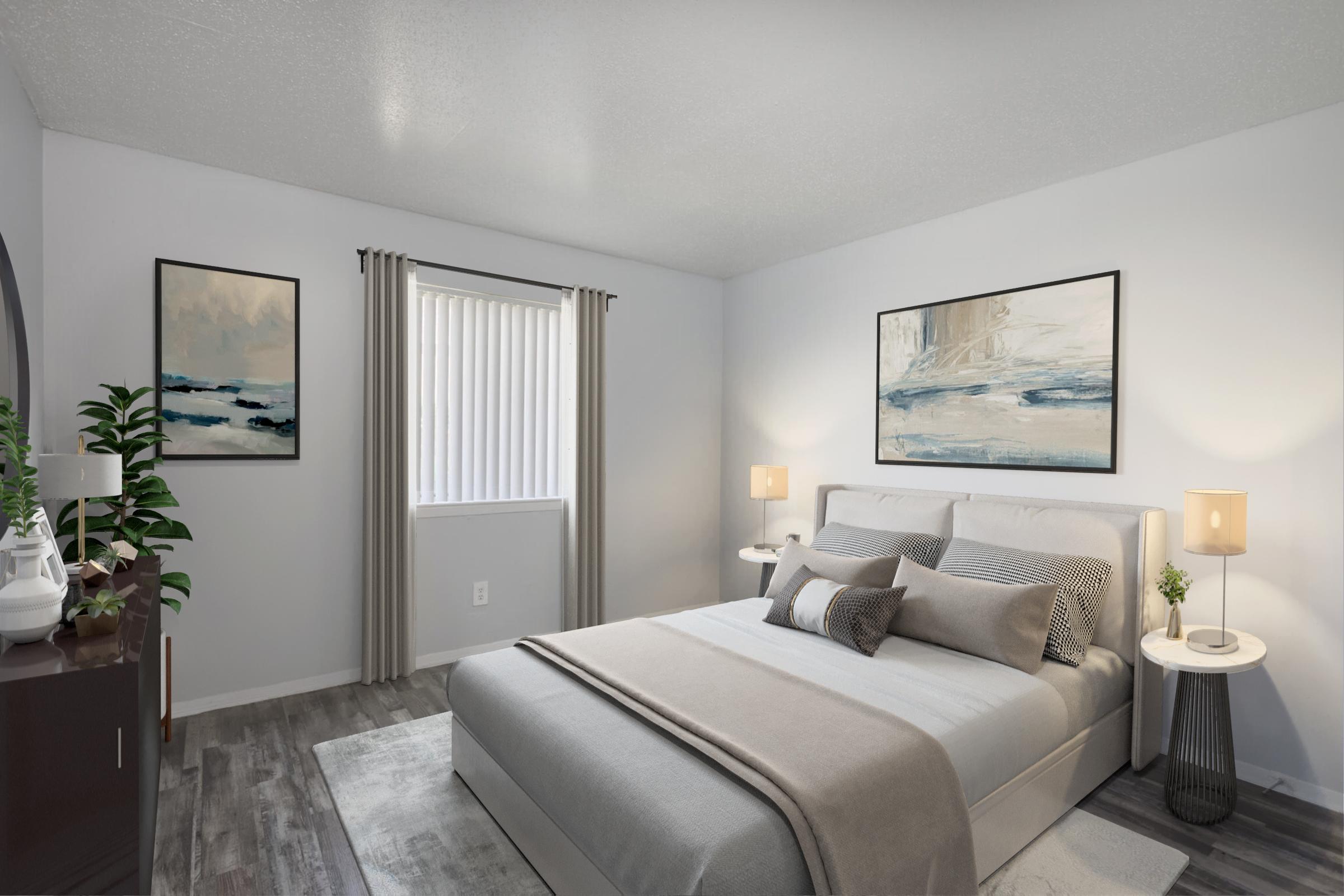 a bedroom with a large bed in a hotel room