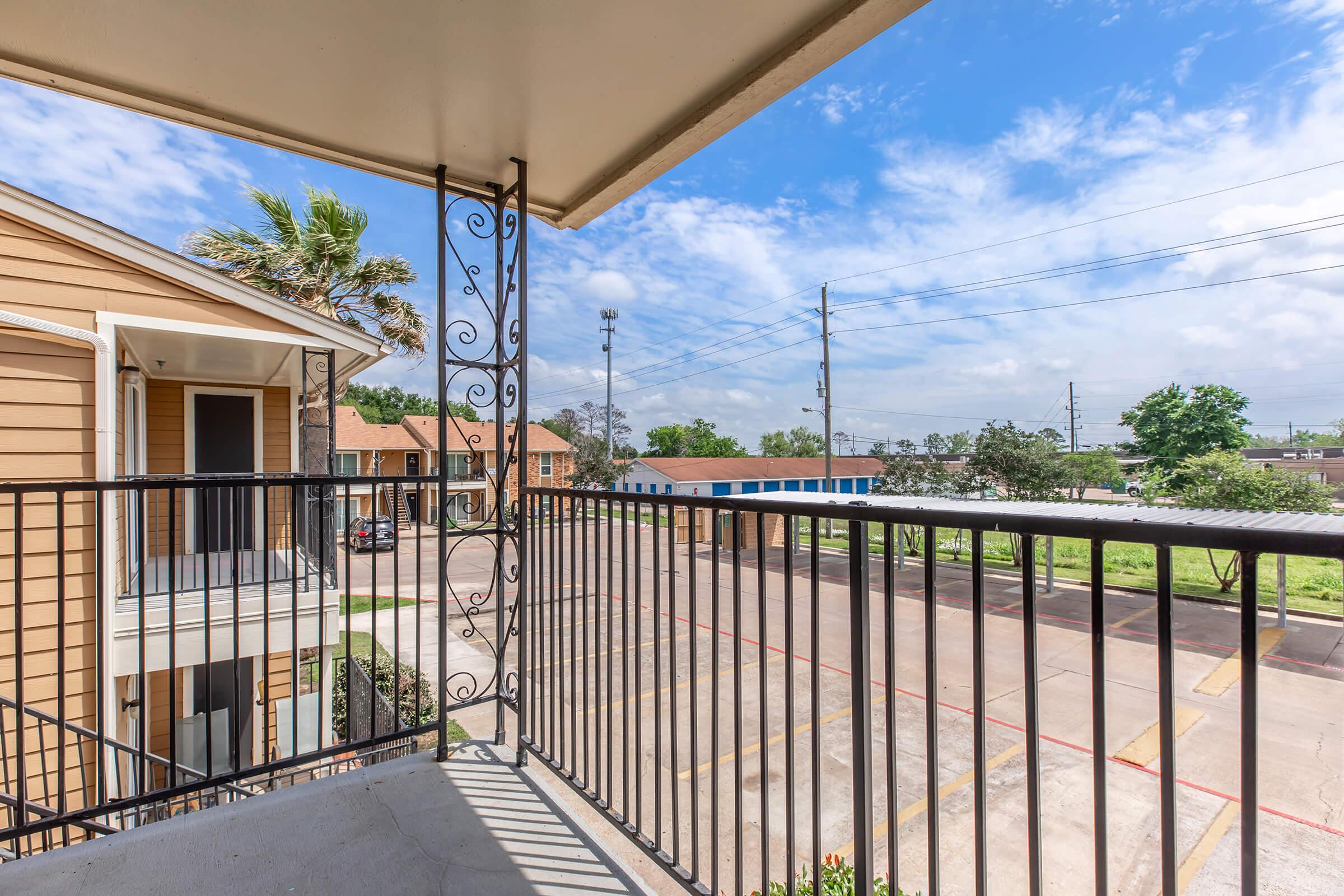 a building with a metal fence