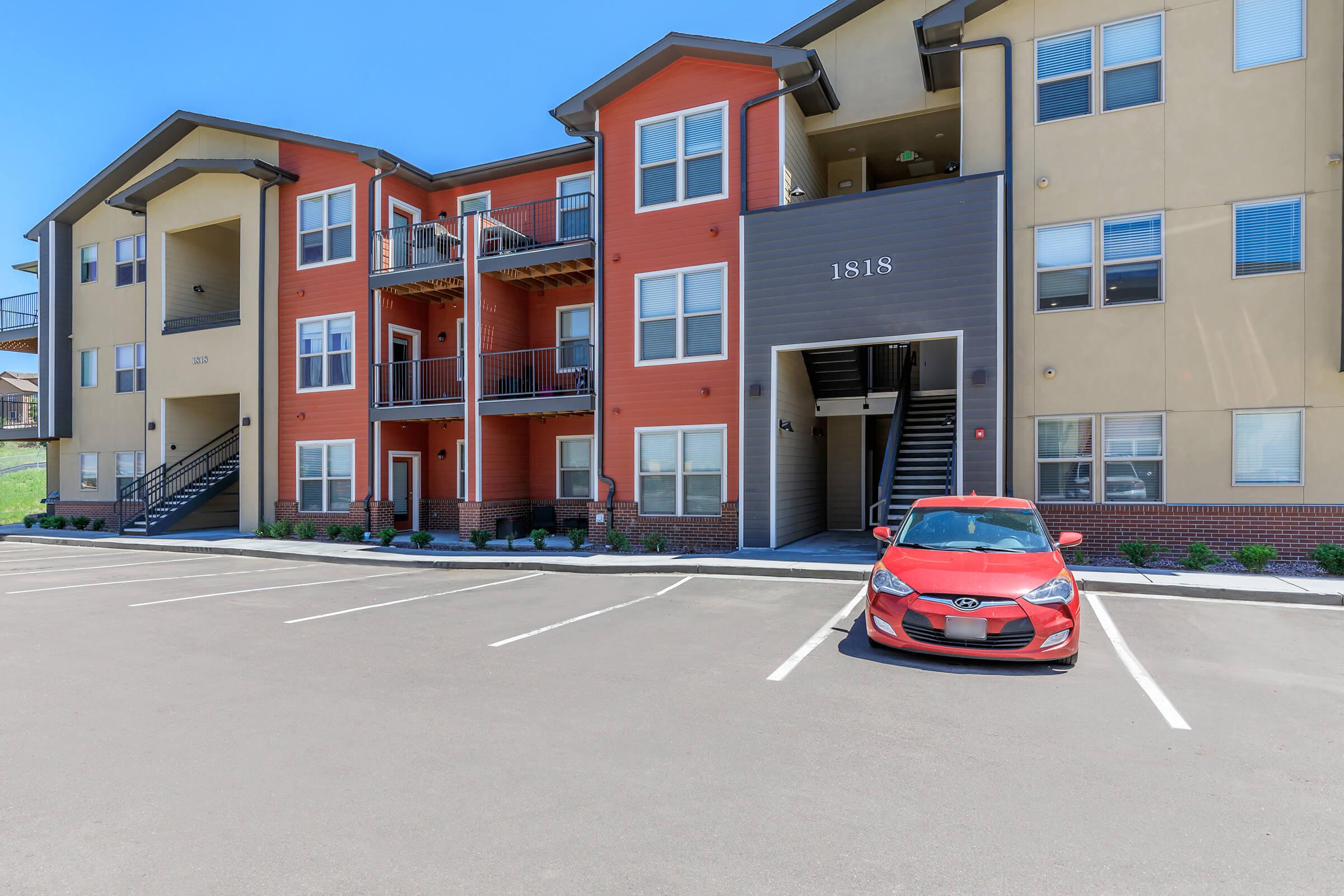 a car parked in front of a building