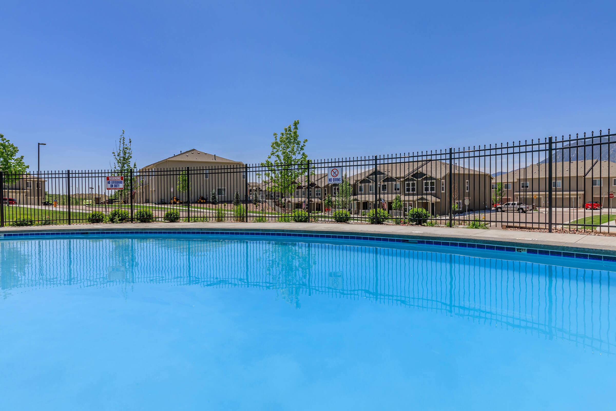 a pool next to a body of water