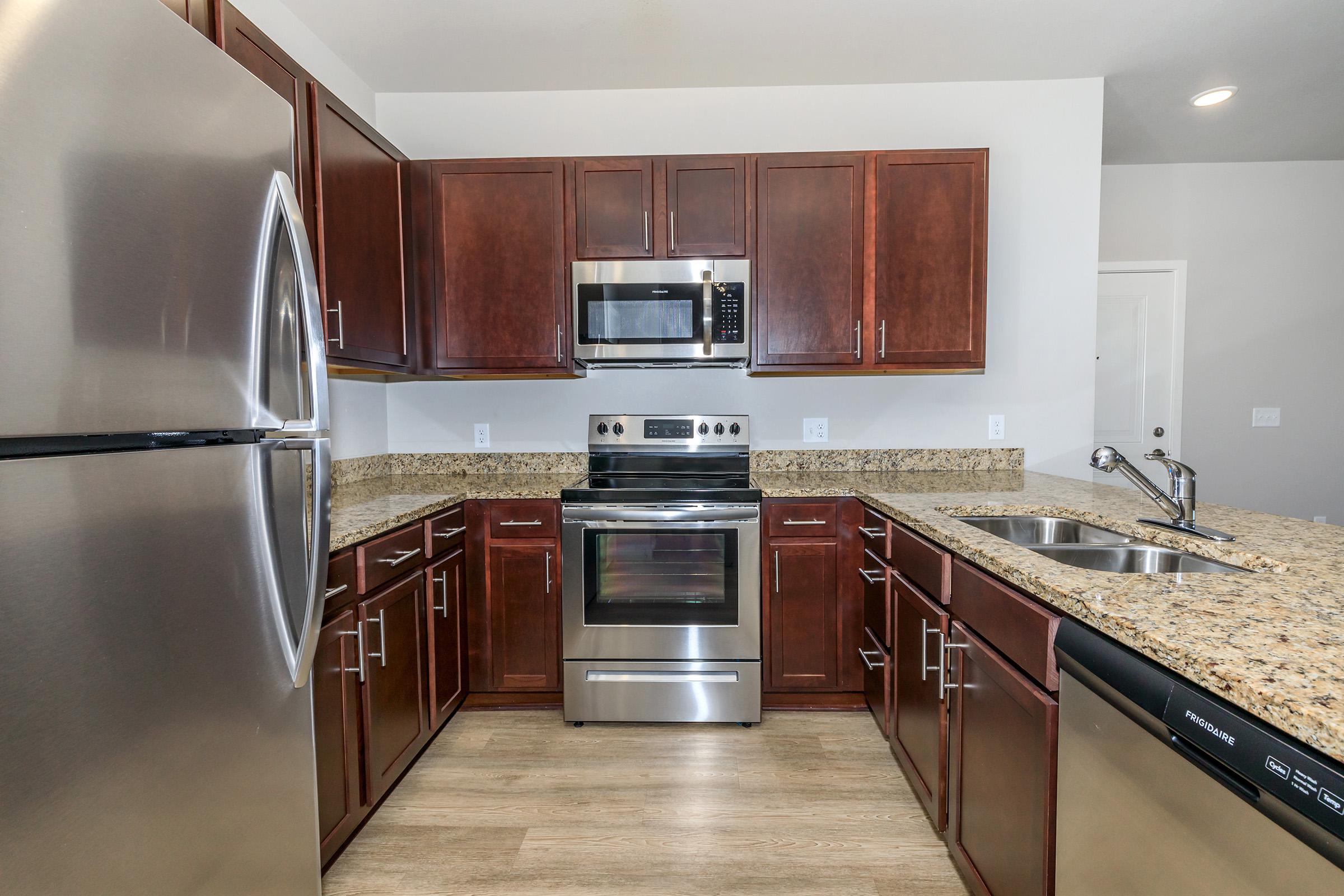 a kitchen with stainless steel appliances