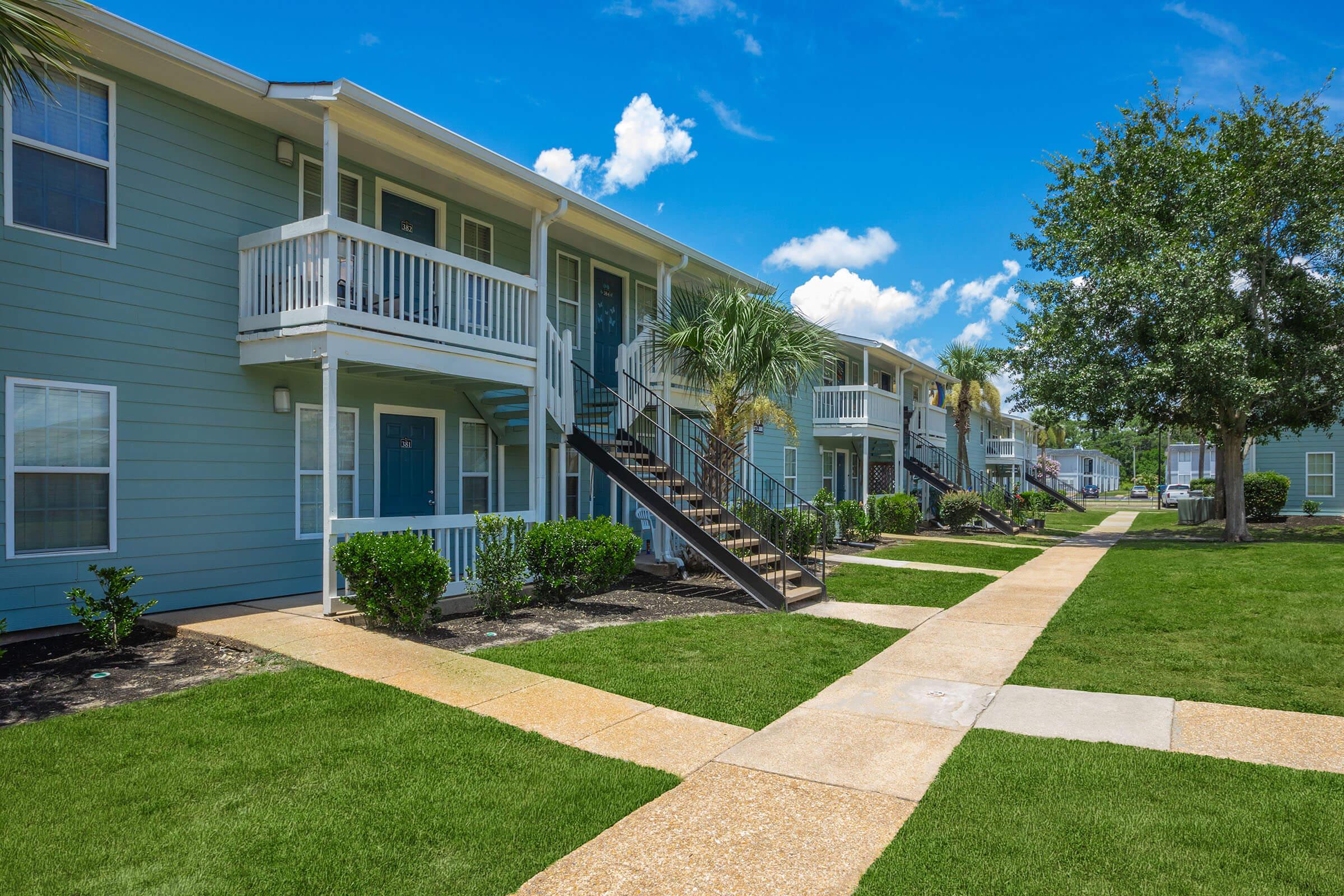 a large lawn in front of a house