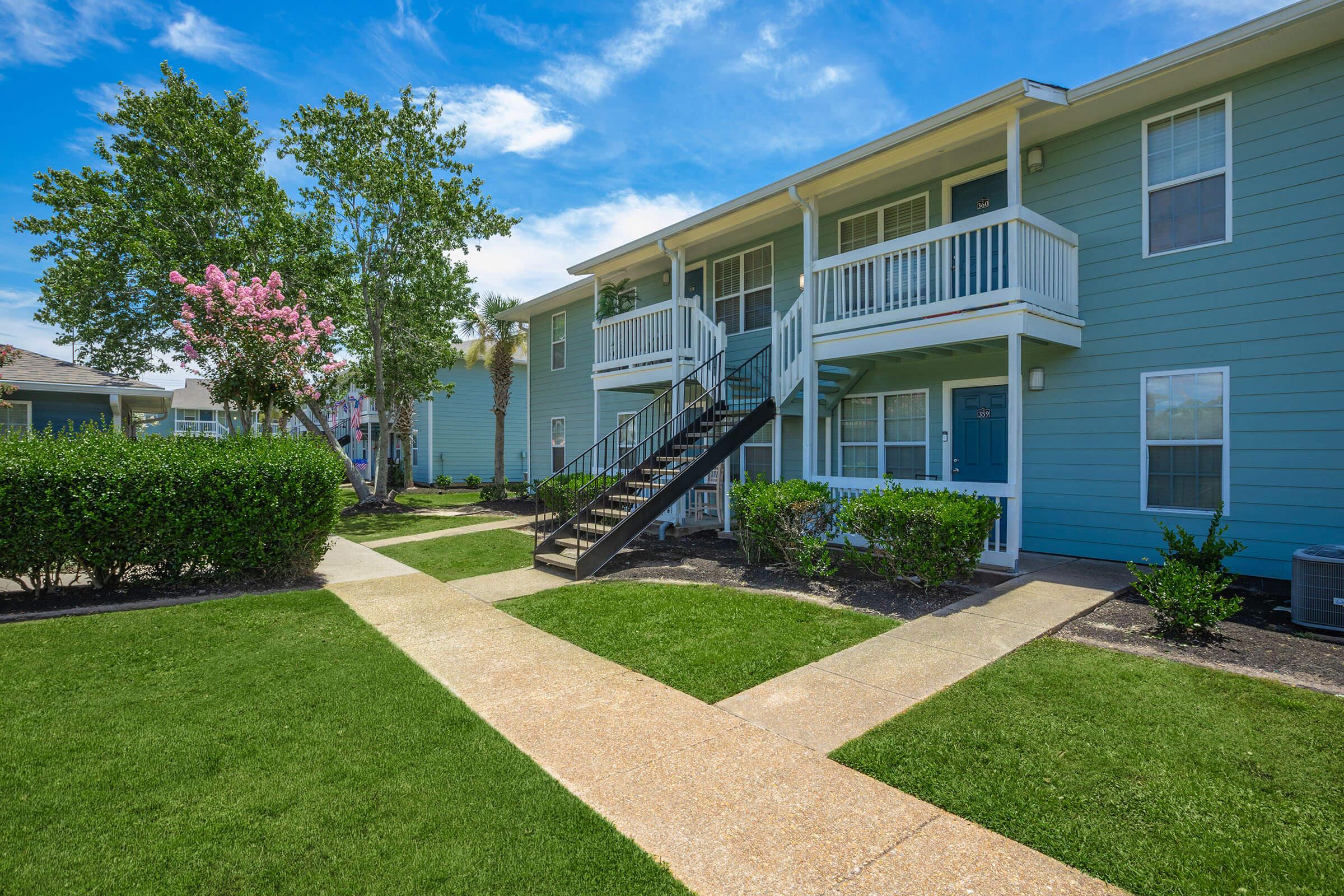 a large lawn in front of a house