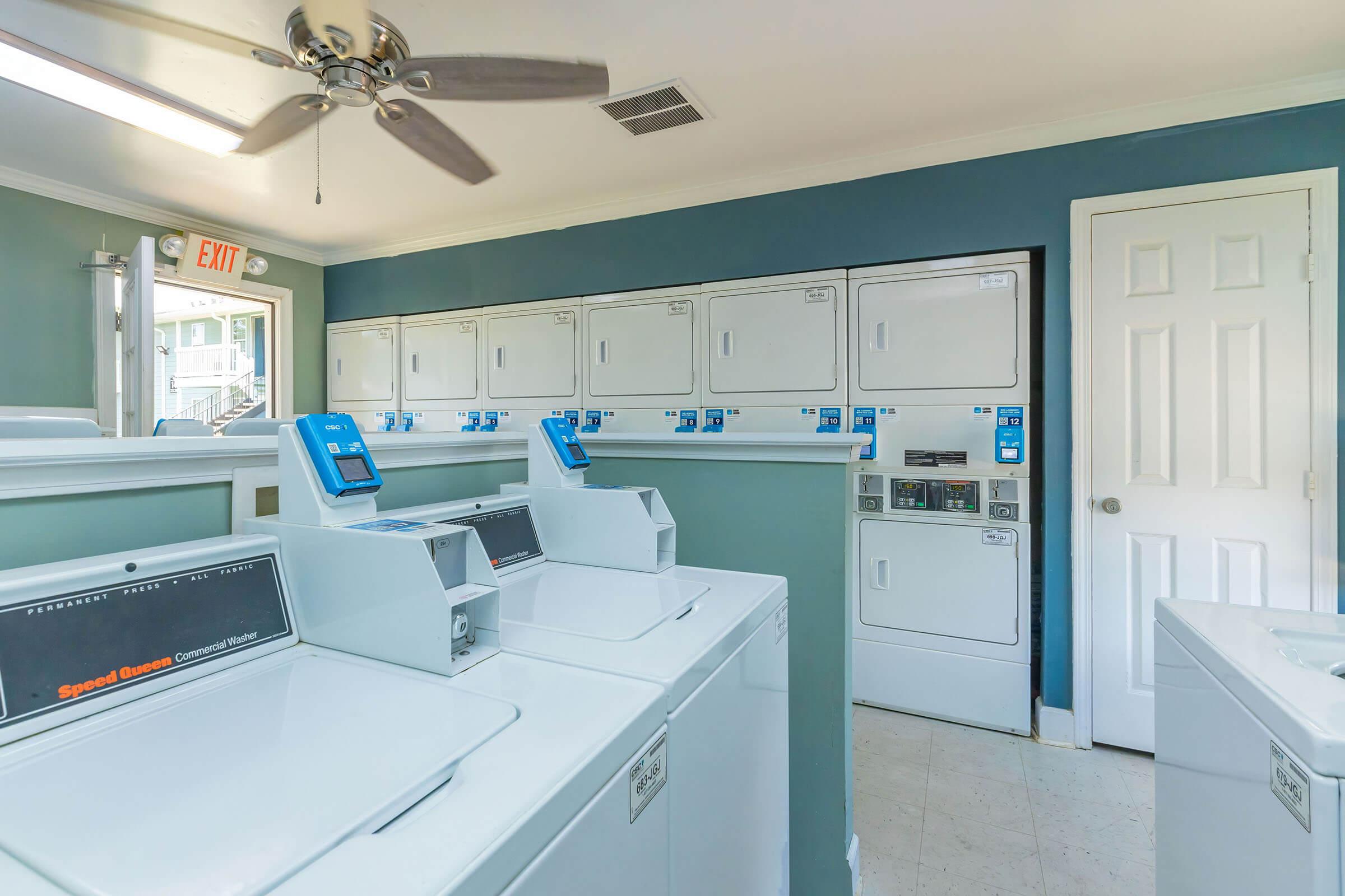 a kitchen with a sink and a refrigerator